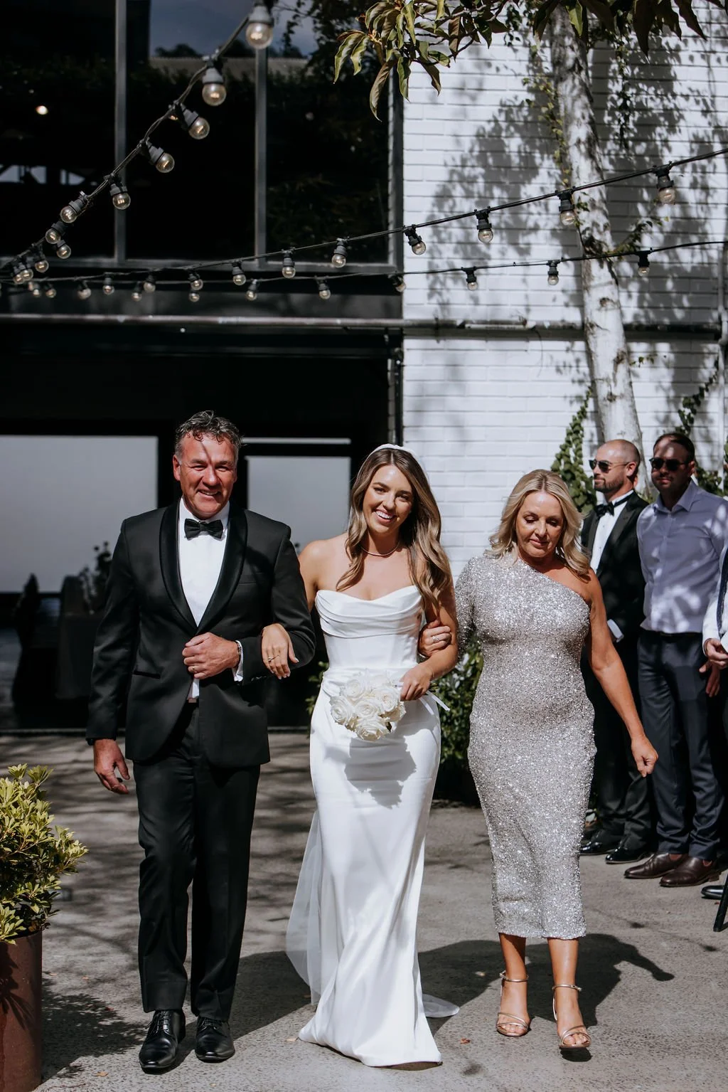 Bride walking down the aisle at her Butler Lane wedding