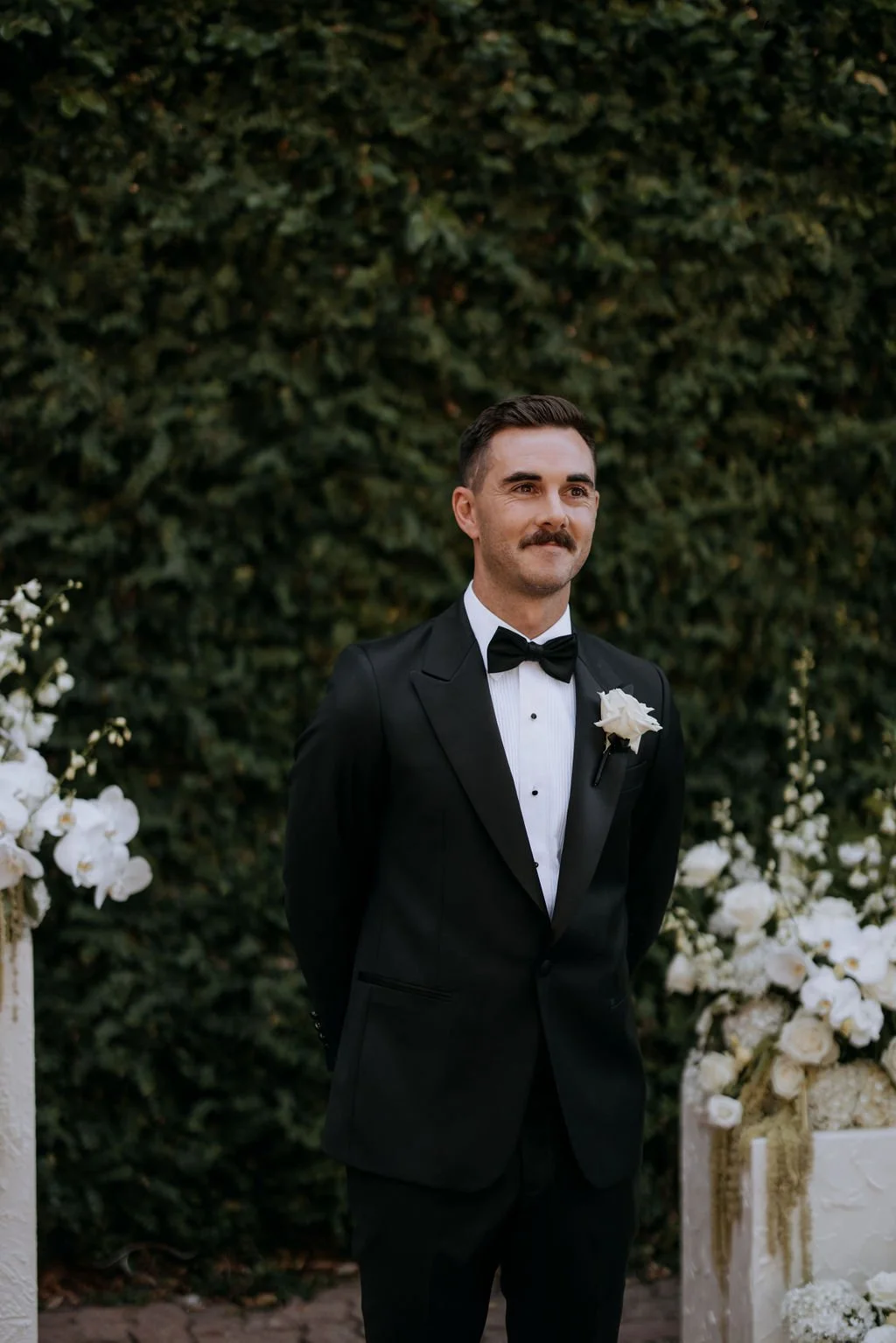 Groom waiting at the altar during Butler Lane wedding ceremony