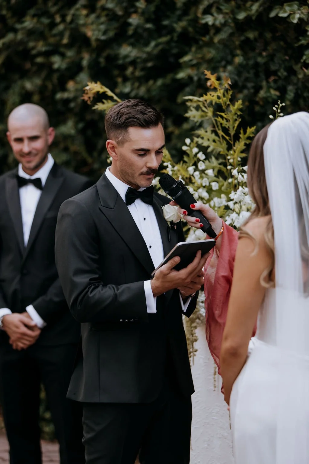 Groom reading his vows at Butler Lane wedding