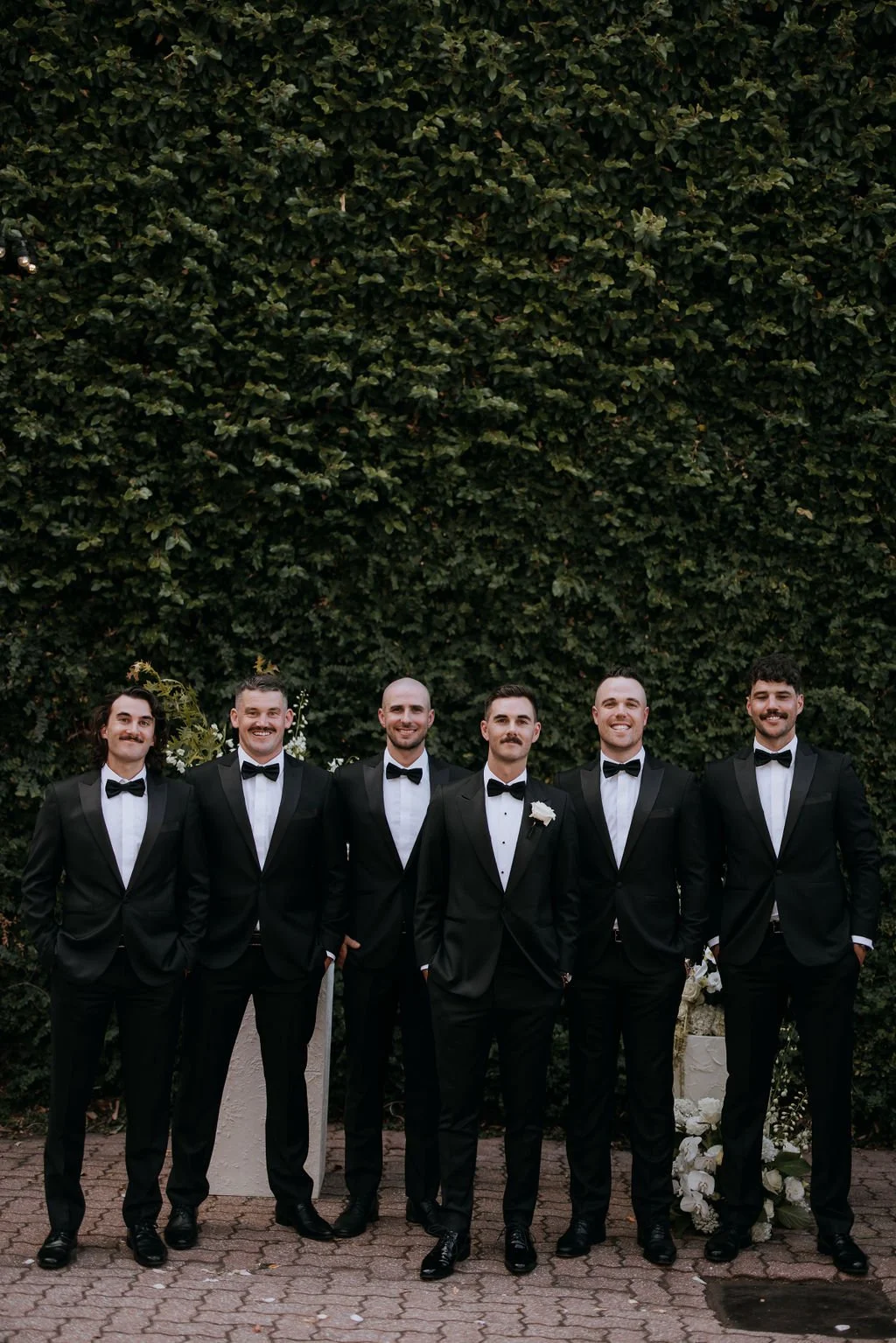 Groomsmen during the ceremony at Butler Lane