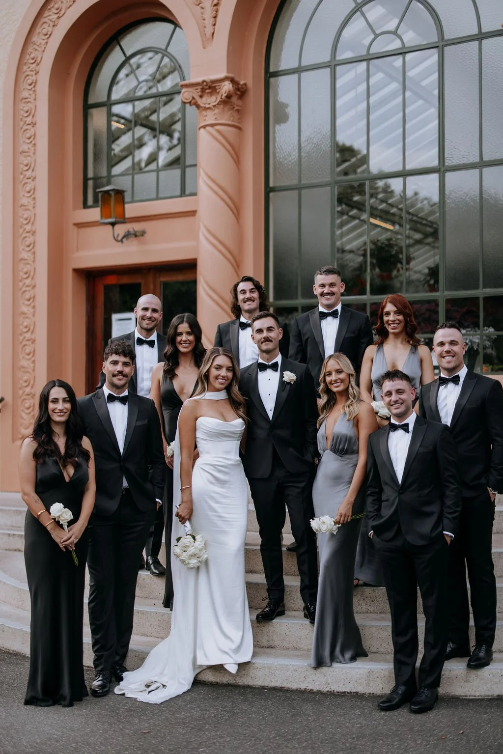 Wedding party group photo at Fitzroy Gardens, MelbourneWedding party group photo at Fitzroy Gardens, Melbourne