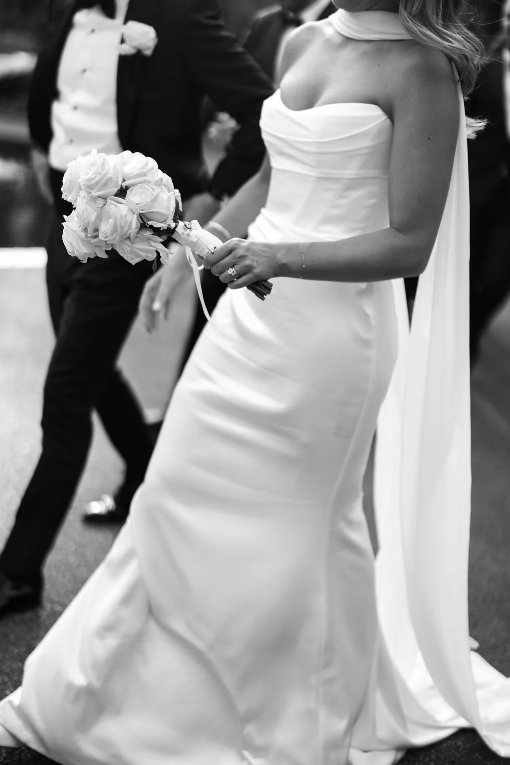 Black and white photo of bride at Fitzroy Gardens