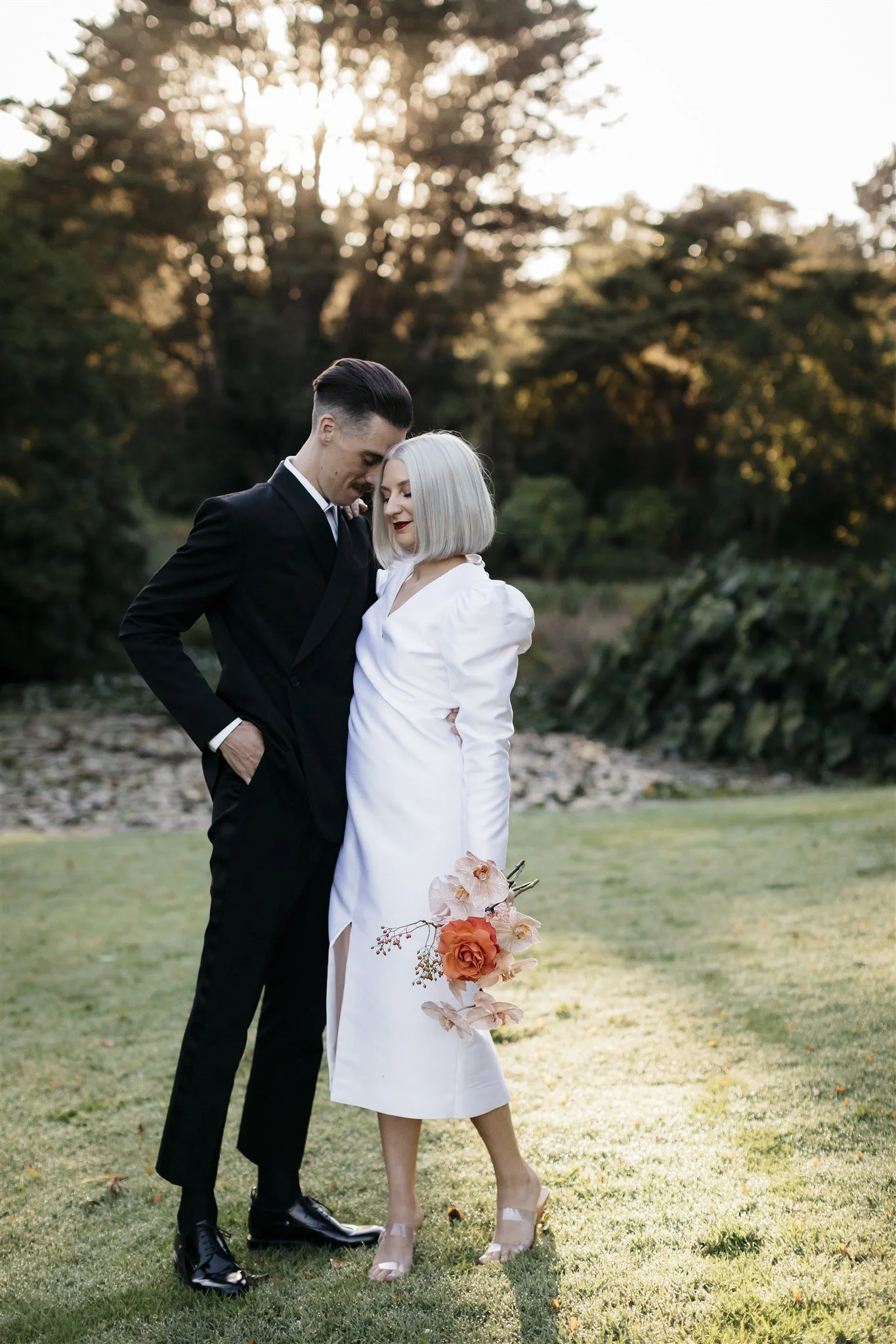 Bride in handmade raw silk wedding dress inspired by 1980s design