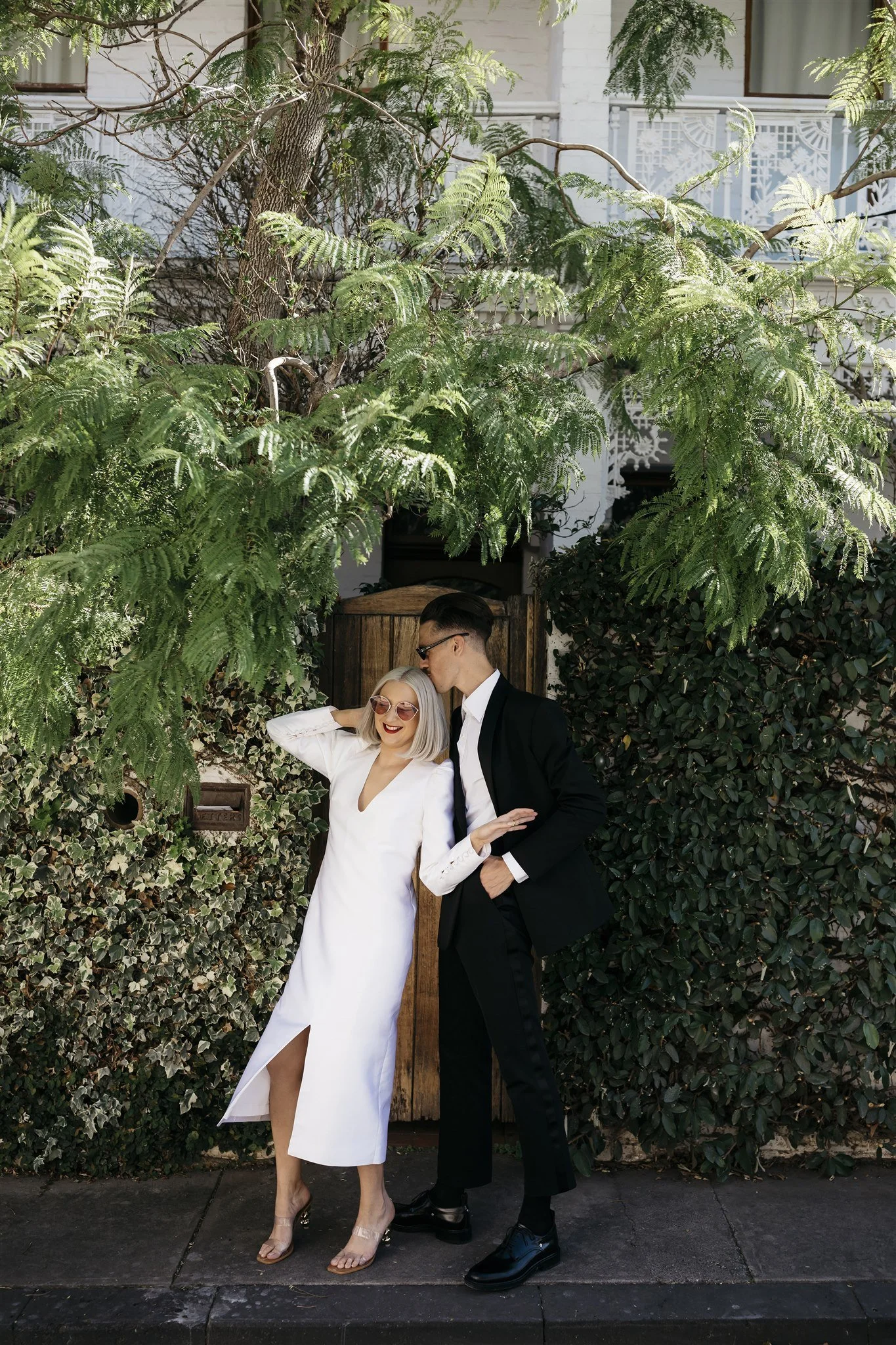 Bride and groom portrait among tree-lined paths, Royal Botanic Gardens