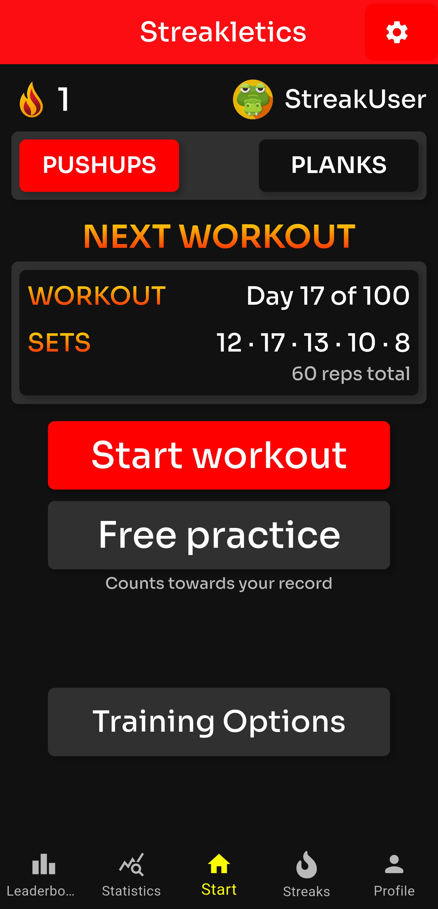 Mobile app screen for Streakletics showing a workout interface with options for pushups or planks, current style identified by a flame icon, and a user named StreakUser. It displays next workout details, total sets, and buttons for starting workout or free practice, with navigation tabs at the bottom.