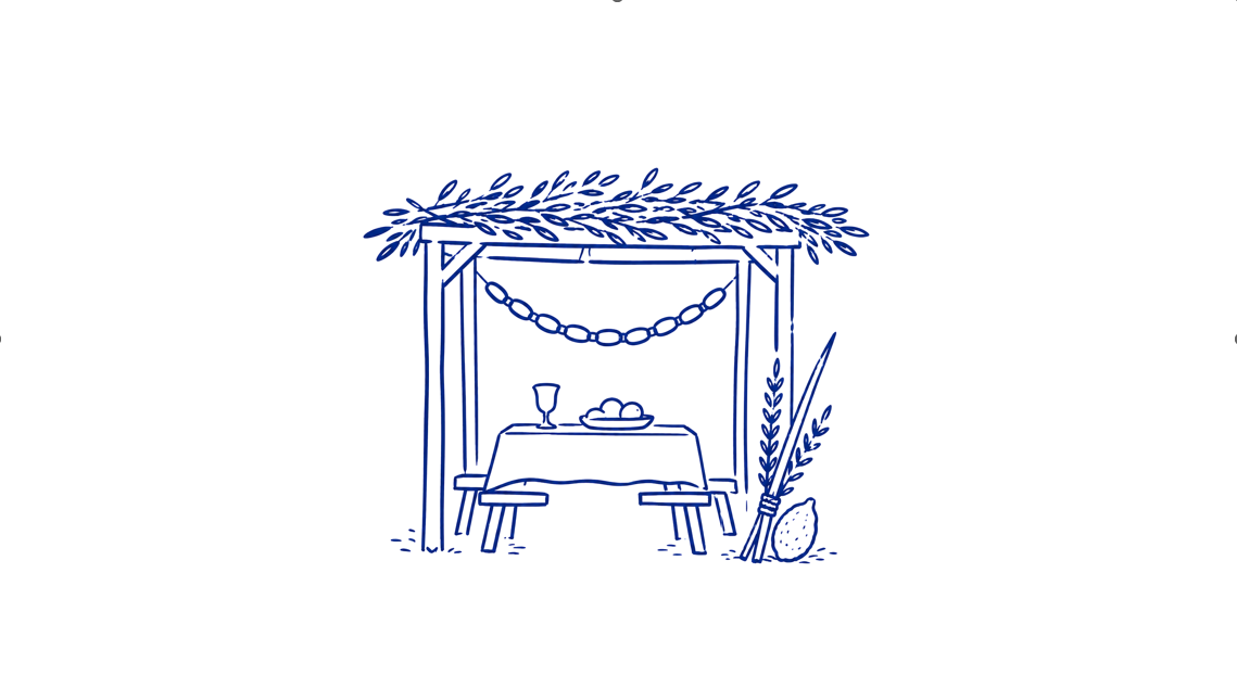 Sukkah with food and decorations for Sukkot.