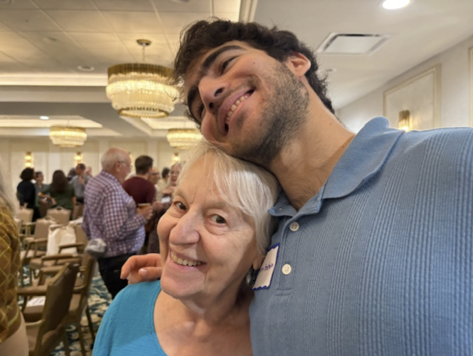 L'dor v'dor (from generation to generation): grandma-grandson hug at Kol Shira service in Austin, TX.