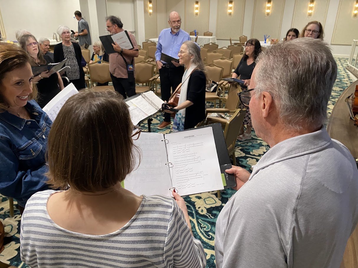 Kol Shira Music Makers and choir members have a quick rehearsal prior to a Shabbat service.