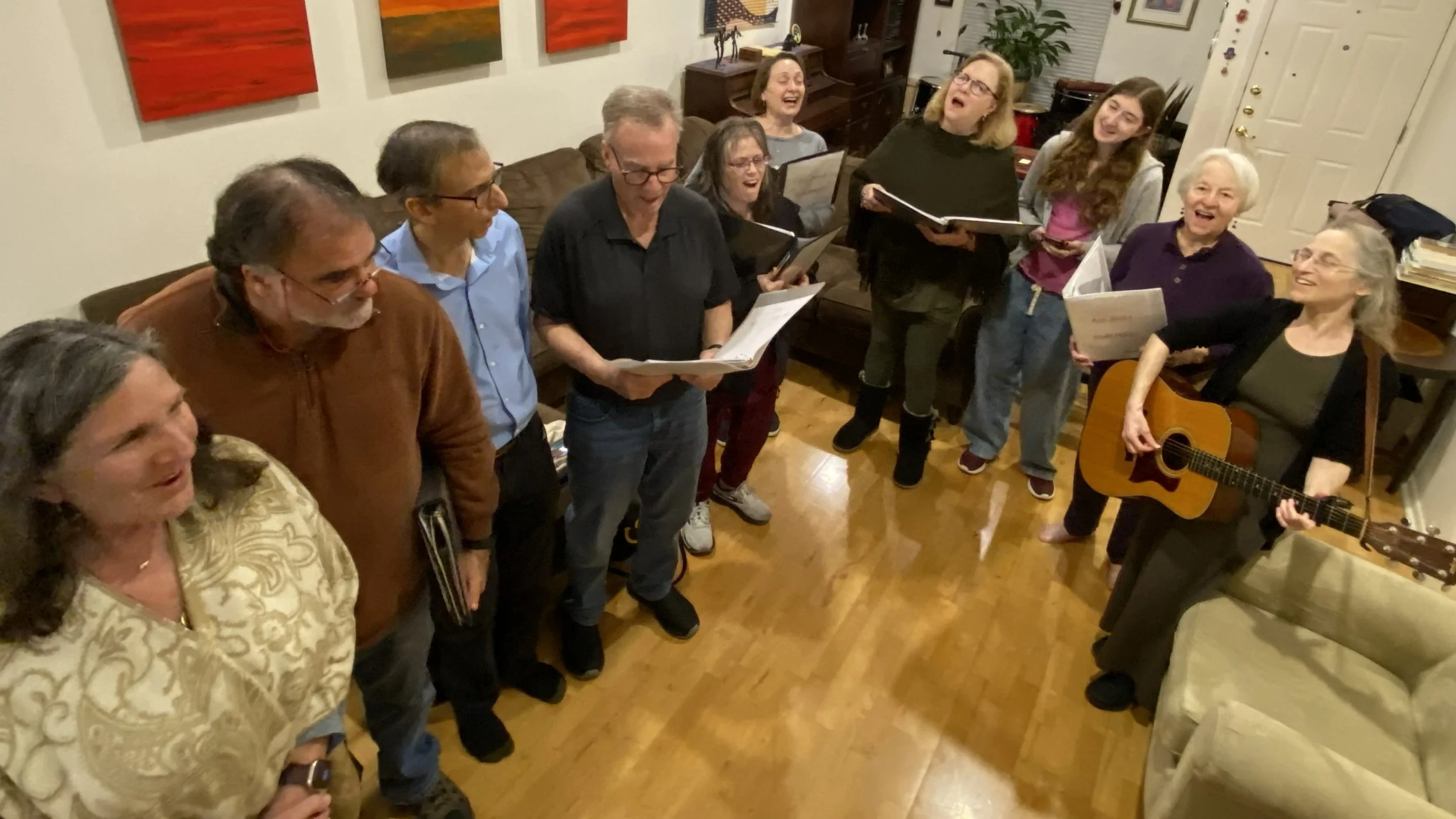 The Kol Shira music makers group gathers for a choir rehearsal.