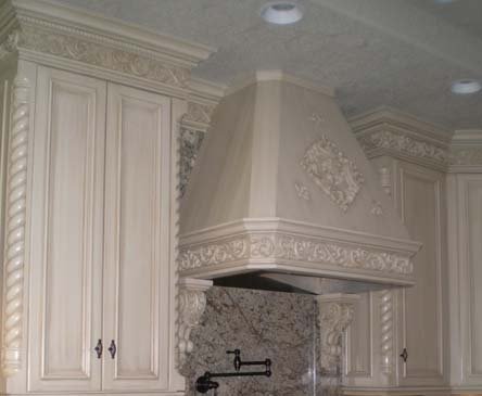 Stove hood and kitchen cabinets.jpg