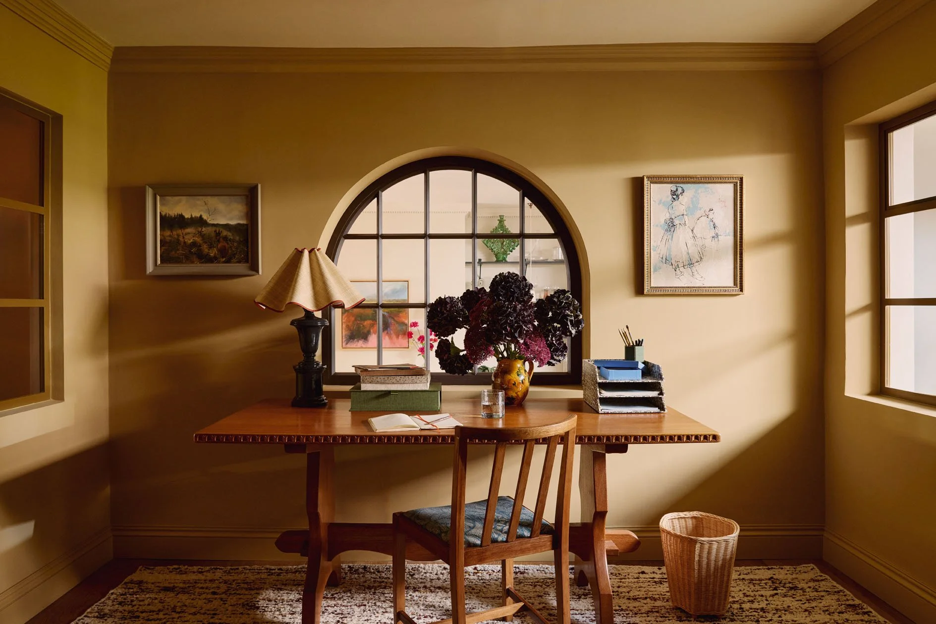 Blue_sitting_room_with_curved_sofas_and_glass_coff.jpg