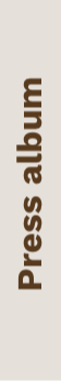 Texte vertical indiquant 'Press album' dans une couleur marron clair.