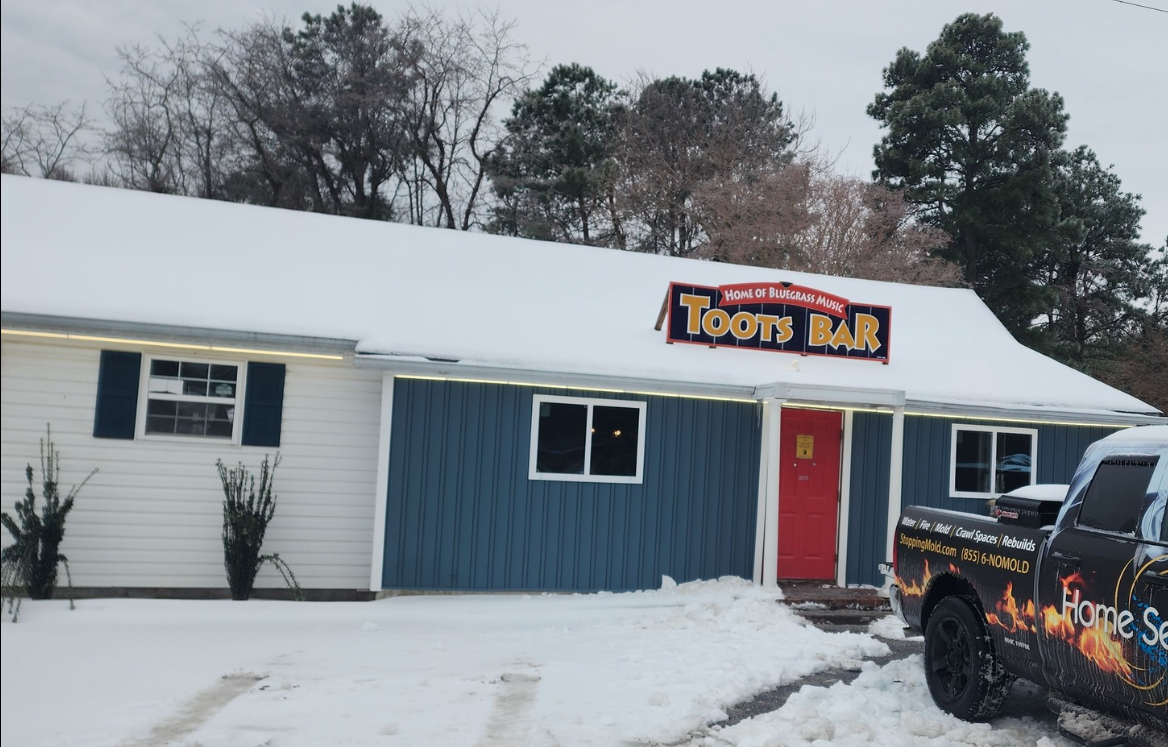 Ribbon Cutting - Toots Bar