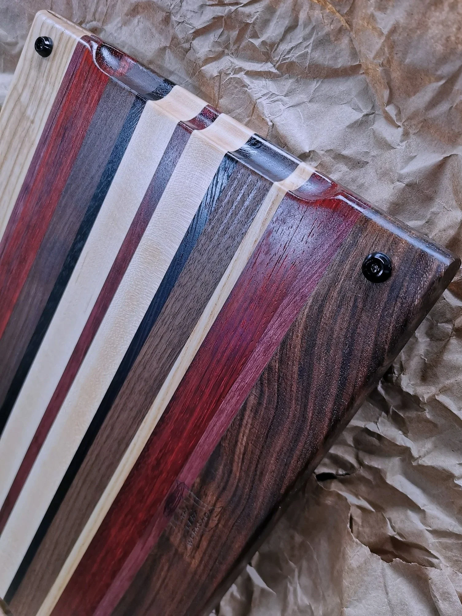 Cutting boards are 100% from hardwood (maple, walnut and ash).
Inserted handle and rubber feet.
Exotic woods included (wenge / purple heart / padauk ).
Name engraving $20 extra.
Customizable to any size and colour variations.