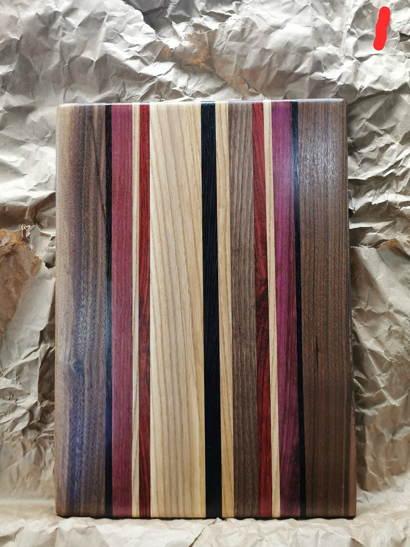 Cutting boards are 100% from hardwood (maple, walnut and ash).
11x14x1.5 inches with inserted handle and rubber feet.
Exotic woods included (wenge / purple heart / padauk ).
Name engraving $20 extra.
Customizable to any size and colour variations.