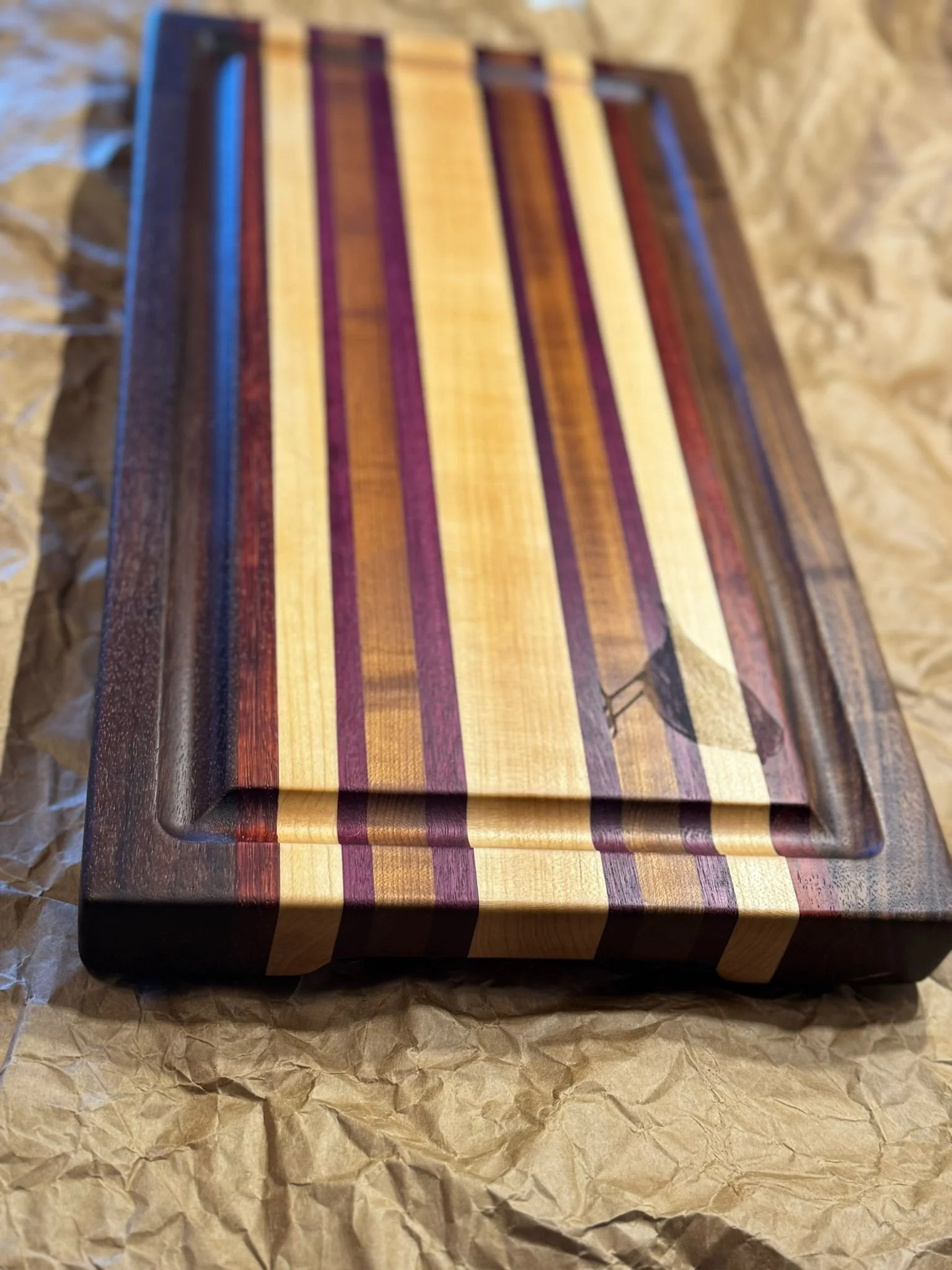 Cutting boards are 100% from hardwood (maple, walnut and ash).
Inserted handle and rubber feet.
Exotic woods included (wenge / purple heart / padauk ).
Name engraving $20 extra.
Customizable to any size and colour variations.