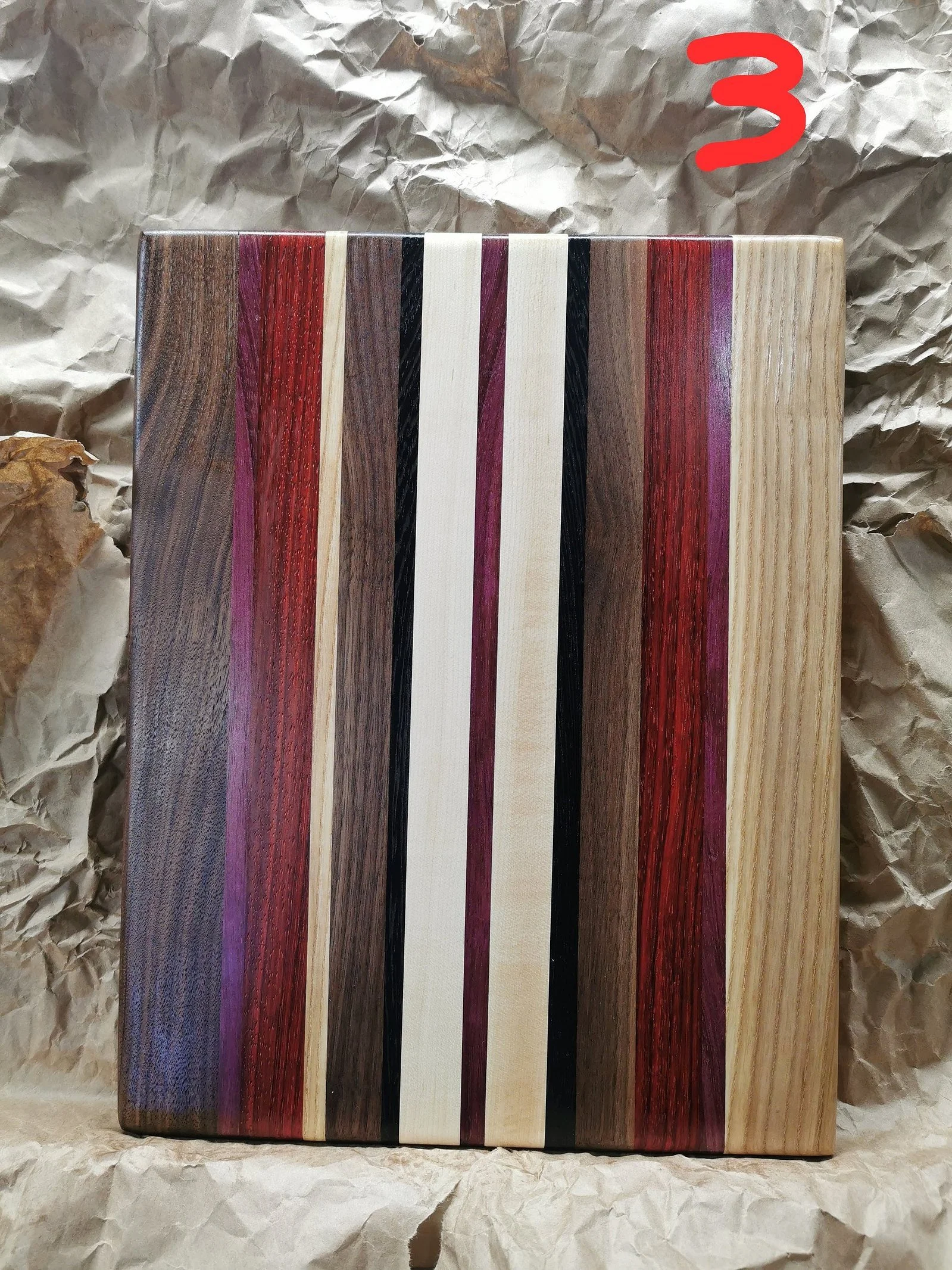 Cutting boards are 100% from hardwood (maple, walnut and ash).
11x14x1.5 inches with inserted handle and rubber feet.
Exotic woods included (wenge / purple heart / padauk ).
Name engraving $20 extra.
Customizable to any size and colour variations.