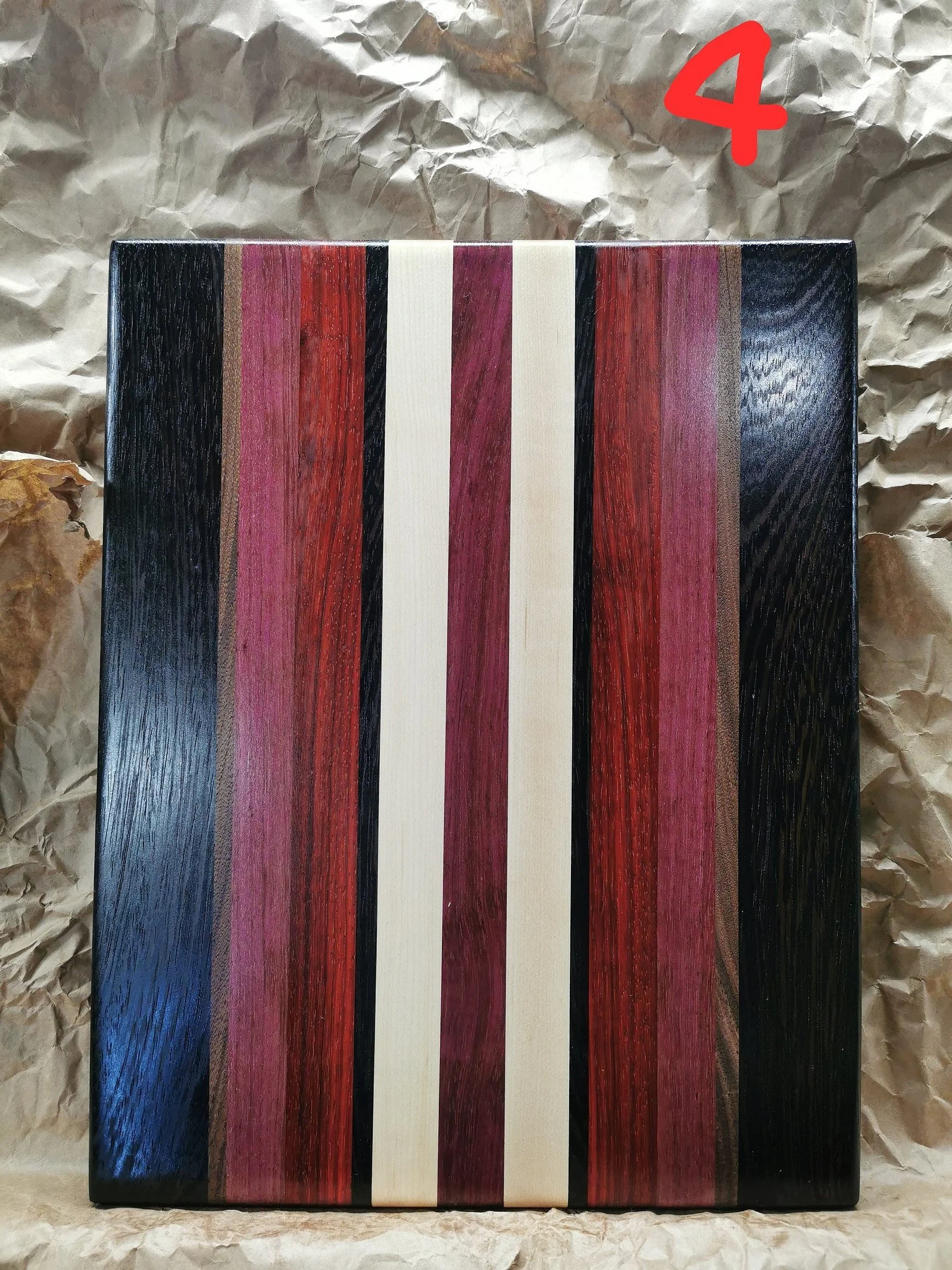 Cutting boards are 100% from hardwood (maple, walnut and ash).
11x14x1.5 inches with inserted handle and rubber feet.
Exotic woods included (wenge / purple heart / padauk ).
Name engraving $20 extra.
Customizable to any size and colour variations.