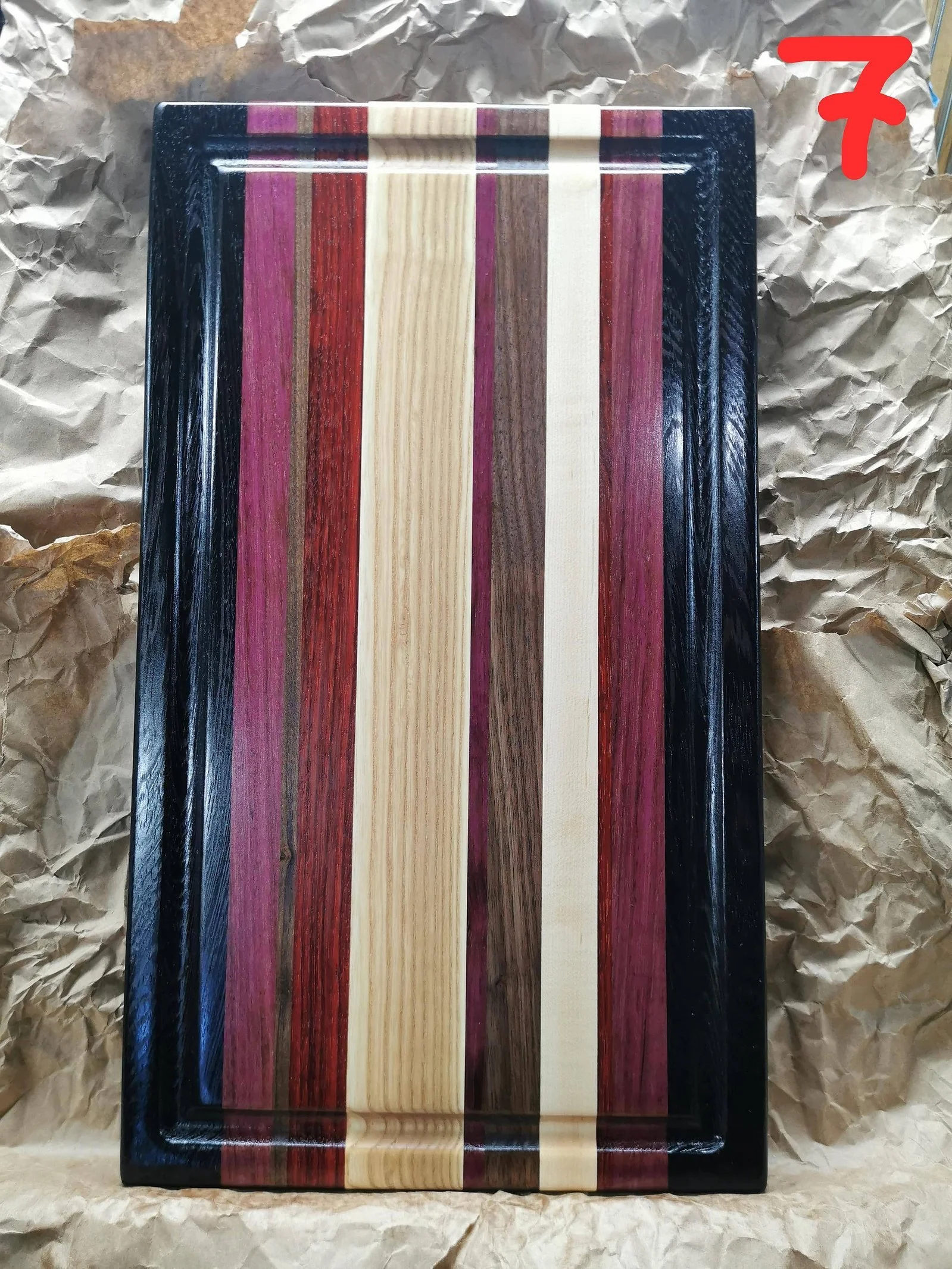 Cutting boards are 100% from hardwood (maple, walnut and ash).
11x18x1.5 inches with inserted handle, juice groove and rubber feet.
Exotic woods included (wenge / purple heart / padauk ).
Name engraving $20 extra.
Customizable to any size and colour