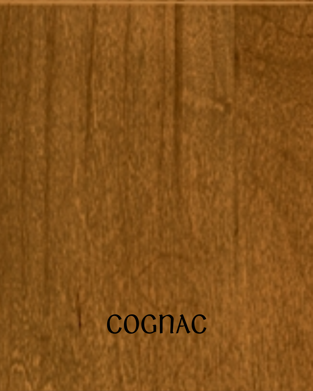 Close-up of a wooden surface with the word 'Cognac' printed in black text.