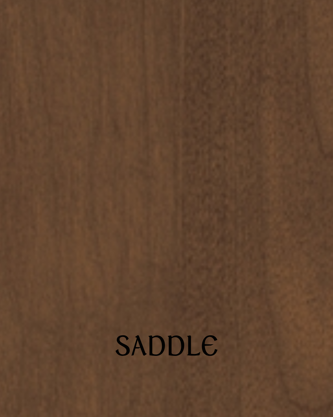 Close-up image of a wooden surface with the word 'SADDLE' written at the bottom.