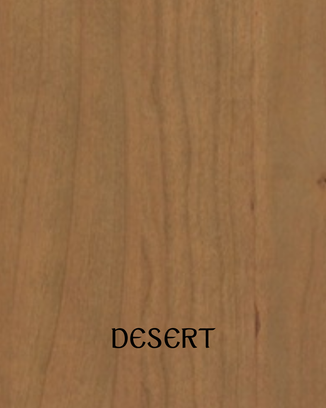 Wooden surface with the word 'DESERT' written in black text.
