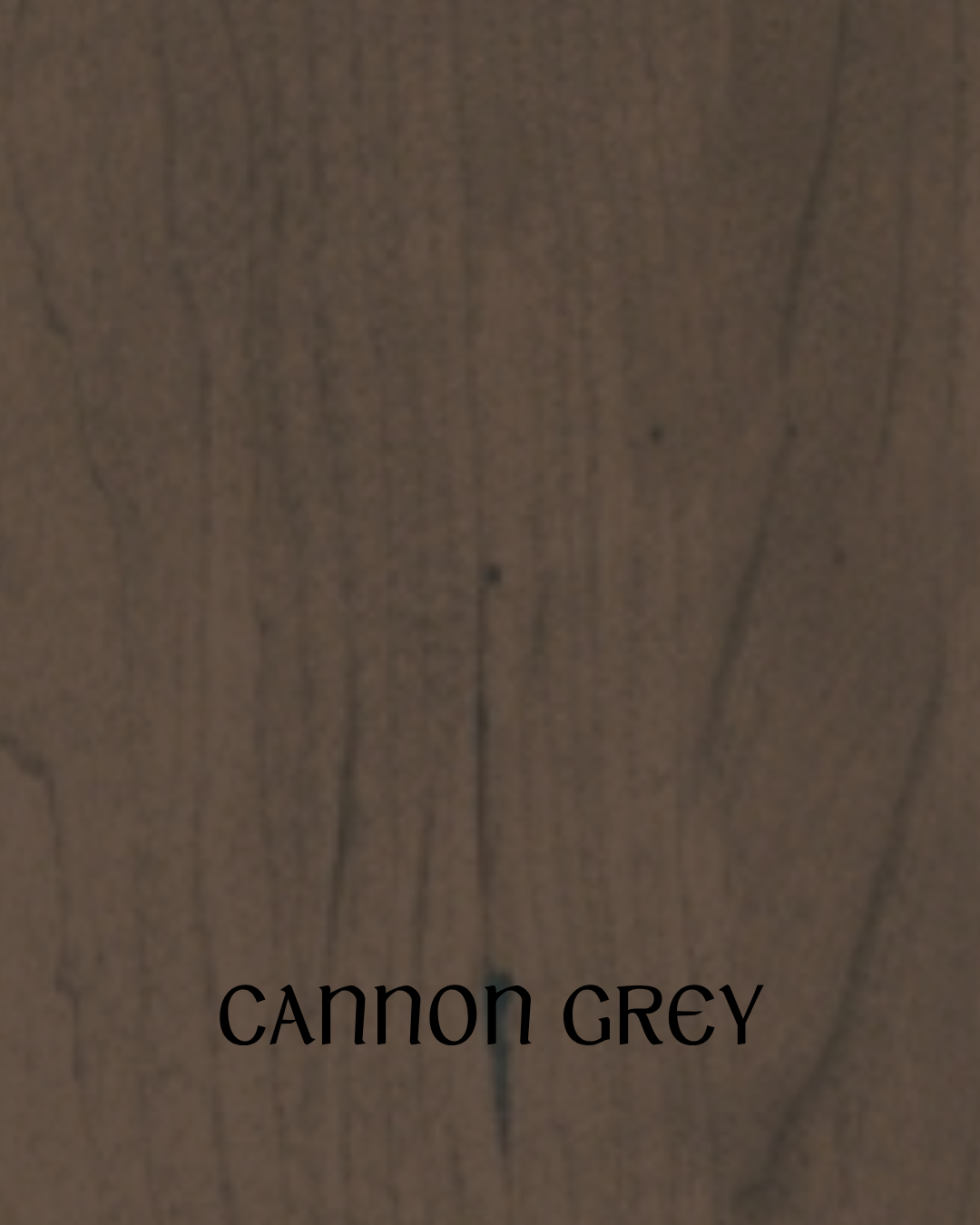 Close-up of a wooden surface with the text 'CANNON GREY'Overlayed.