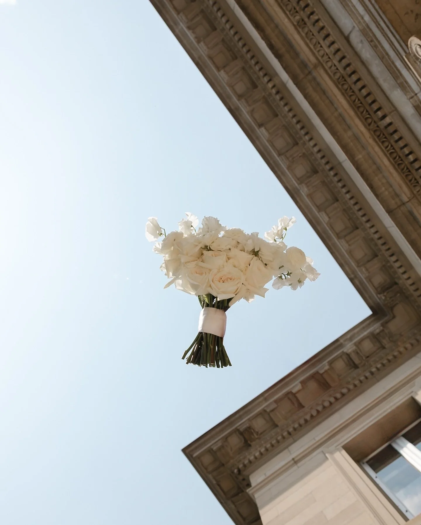 In her childhood room, the sunlight glows,
Soft as the lace her mother chose.
Laughter and perfume drift through the air,
Echoes of love are everywhere.

Her father waits by the old front door,
His eyes say what words are for no more.
One last glance