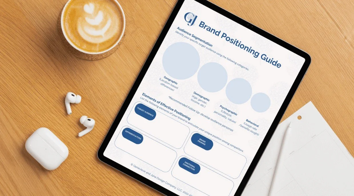 An ipad with a free brand positioning guide for small businesses, from GJ Design Co. on the screen