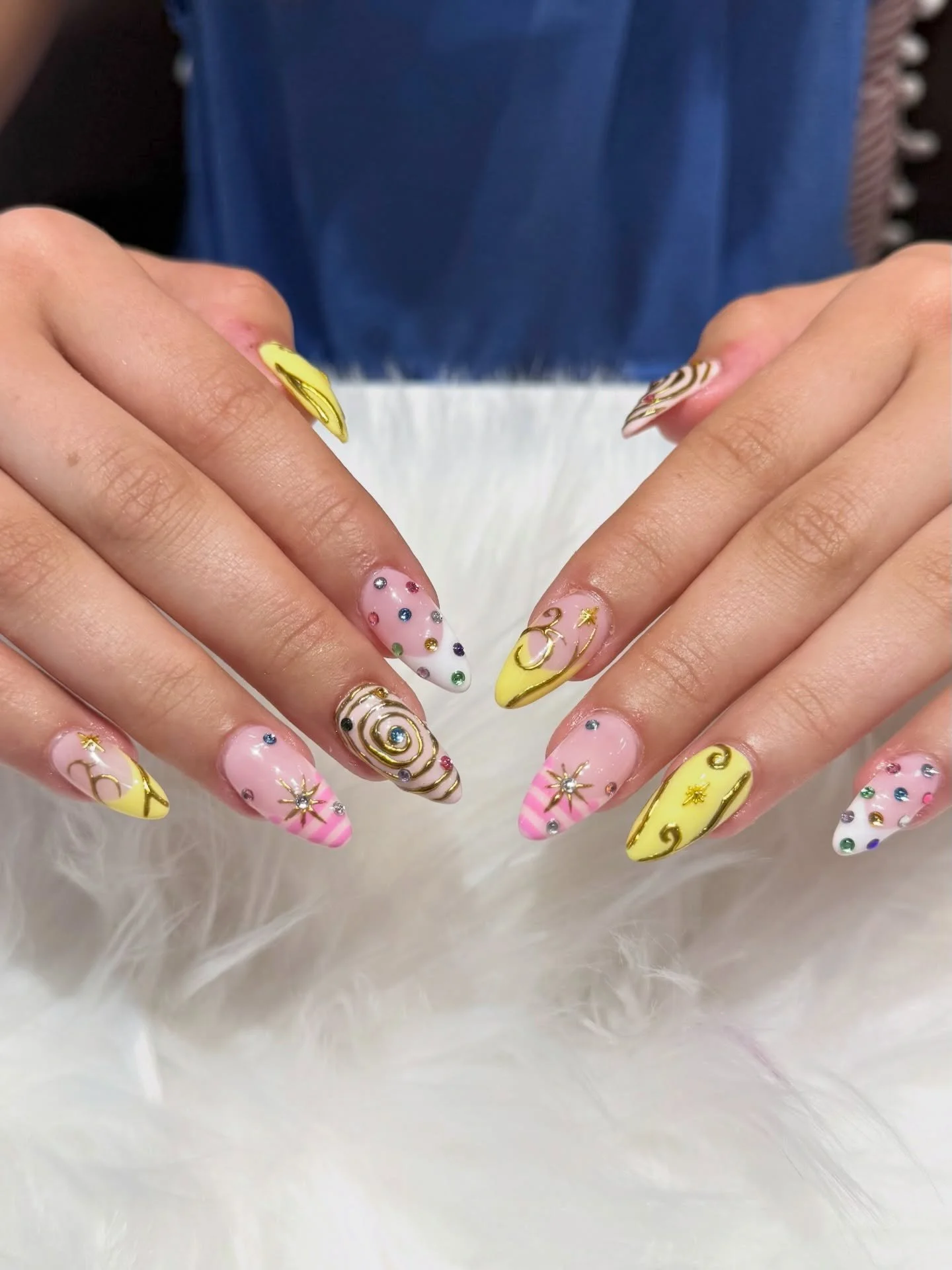 Pink + yellow candy dreams with gold swirls and gem magic! 

#nailsalon #Bellagionailsparaleigh #naildesign #promnight #gelx 

 
BELLAGIO NAIL SPA
📍8845 Six Forks Rd
  Raleigh, NC 27615 
☎️ (984) 232-8718