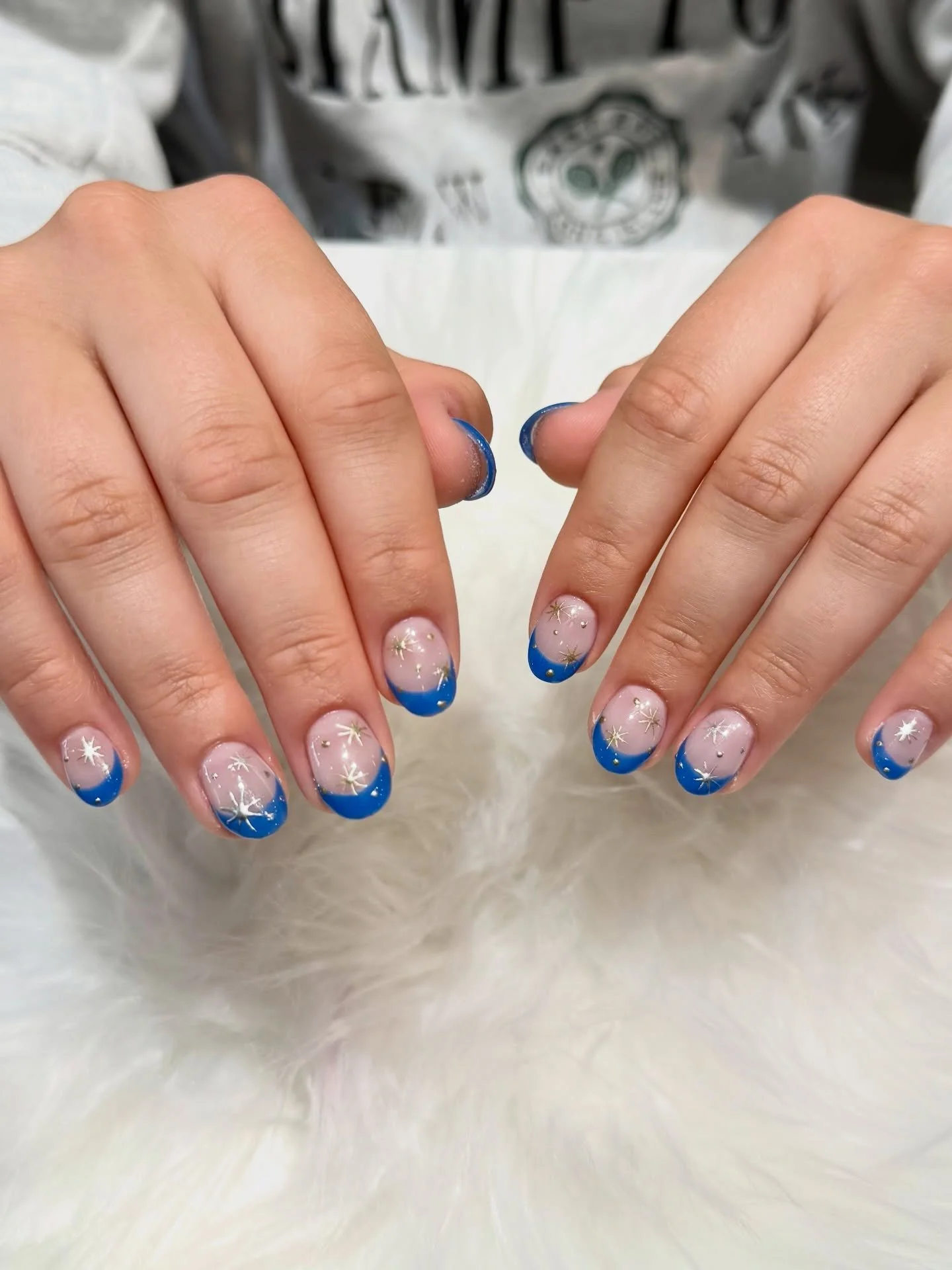 Starry night French mani! Sheer pink base, bold blue tips, and scattered silver + gold stars for that cosmic glow.

#nailsalon #Bellagionailsparaleigh #nails #promnails #notd 

 
BELLAGIO NAIL SPA
📍8845 Six Forks Rd
  Raleigh, NC 27615 
☎️ (984) 232