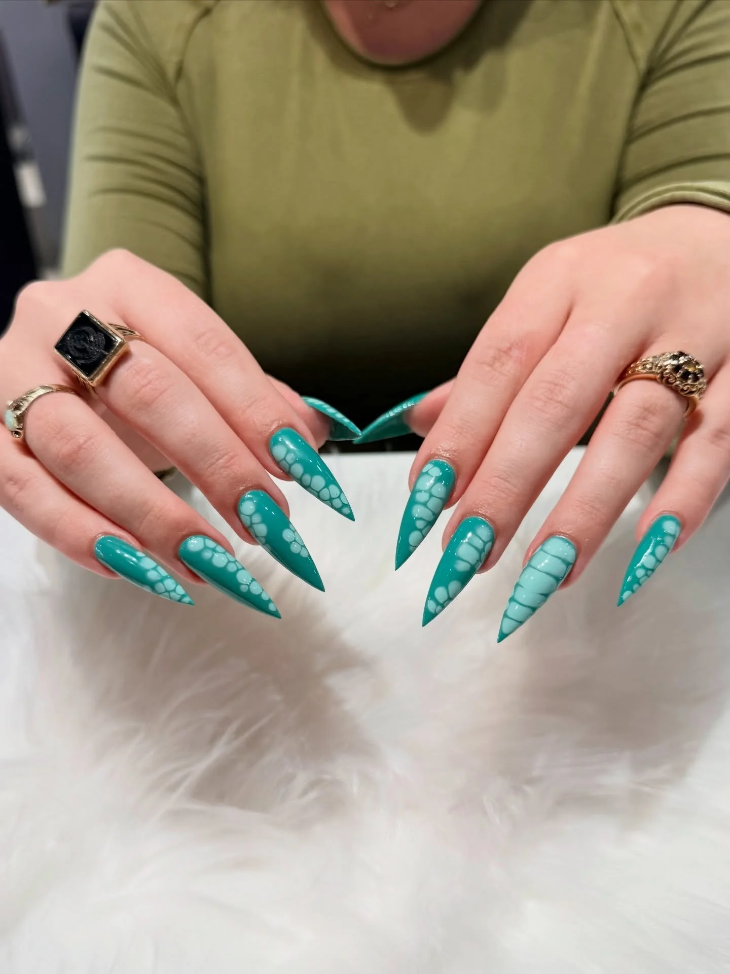 Serving reptile realness! Teal stiletto claws with glossy bubble + croc print details. Not for the faint of heart 🔥 
 
#nailsalon #Bellagionailsparaleigh #nails #gelx #stilletonails 

 
BELLAGIO NAIL SPA
📍8845 Six Forks Rd
  Raleigh, NC 27615 
☎️ (