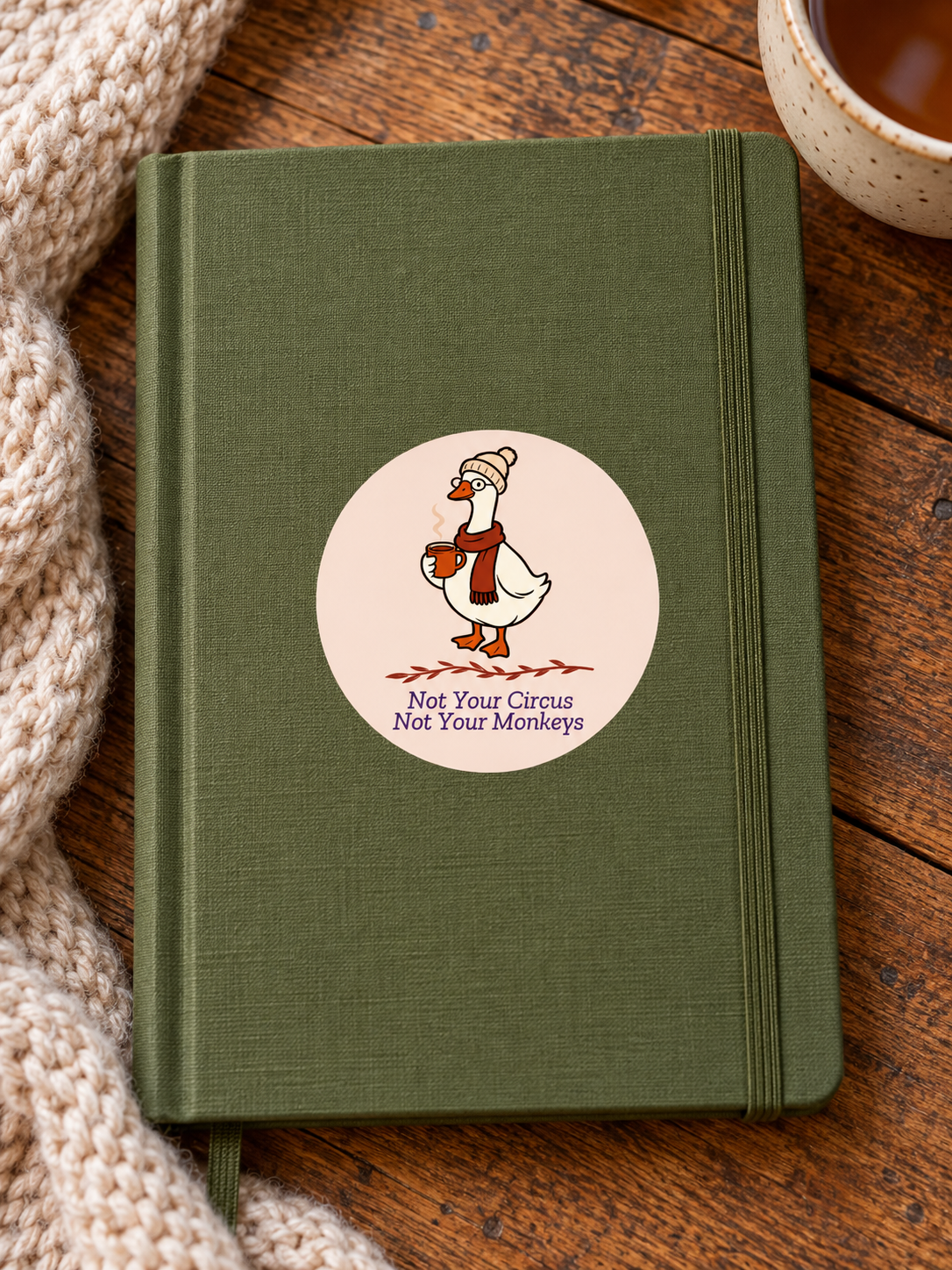 Duck sticker on an olive journal-2.png