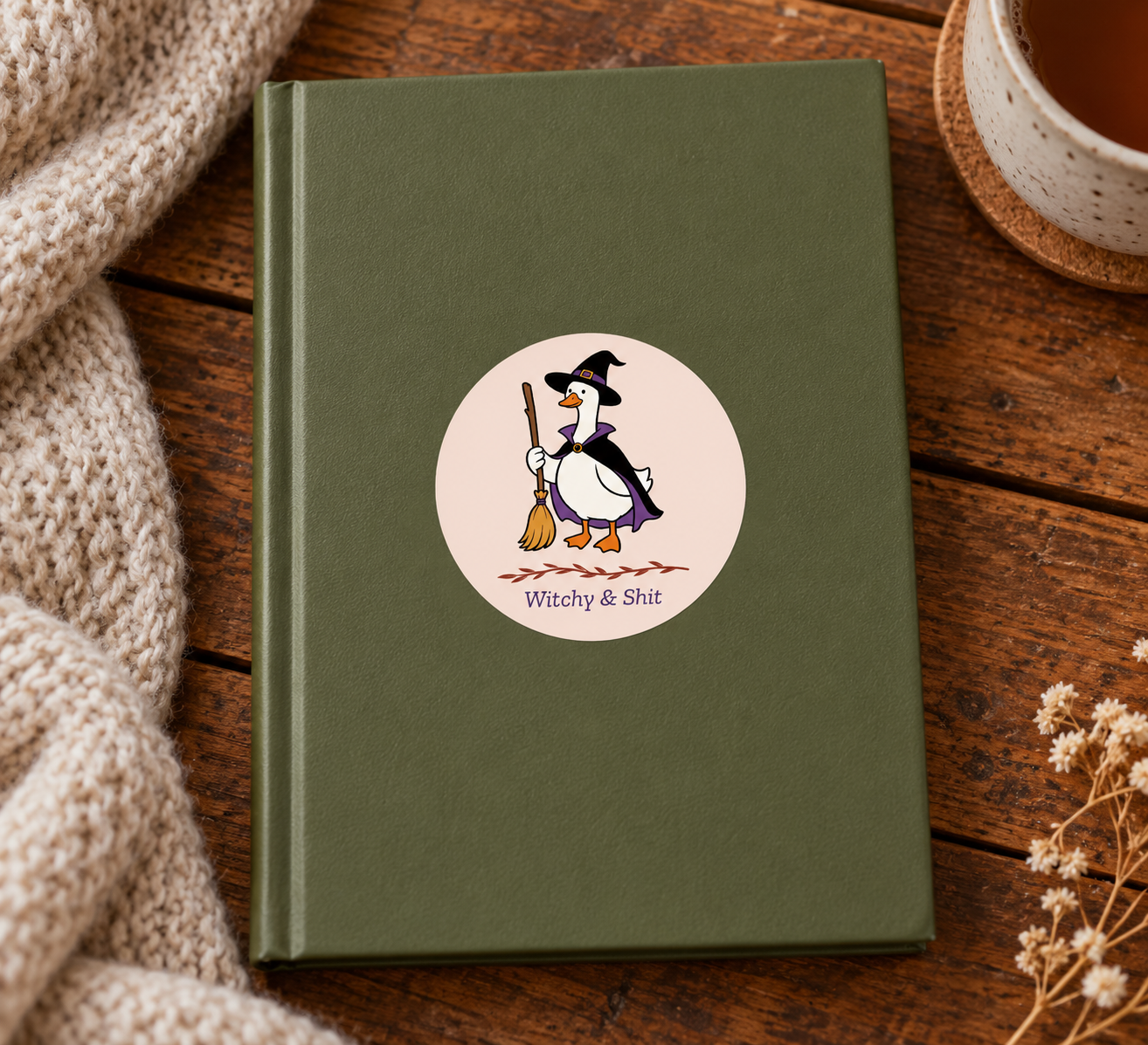 Witch duck sticker on olive journal-2.png
