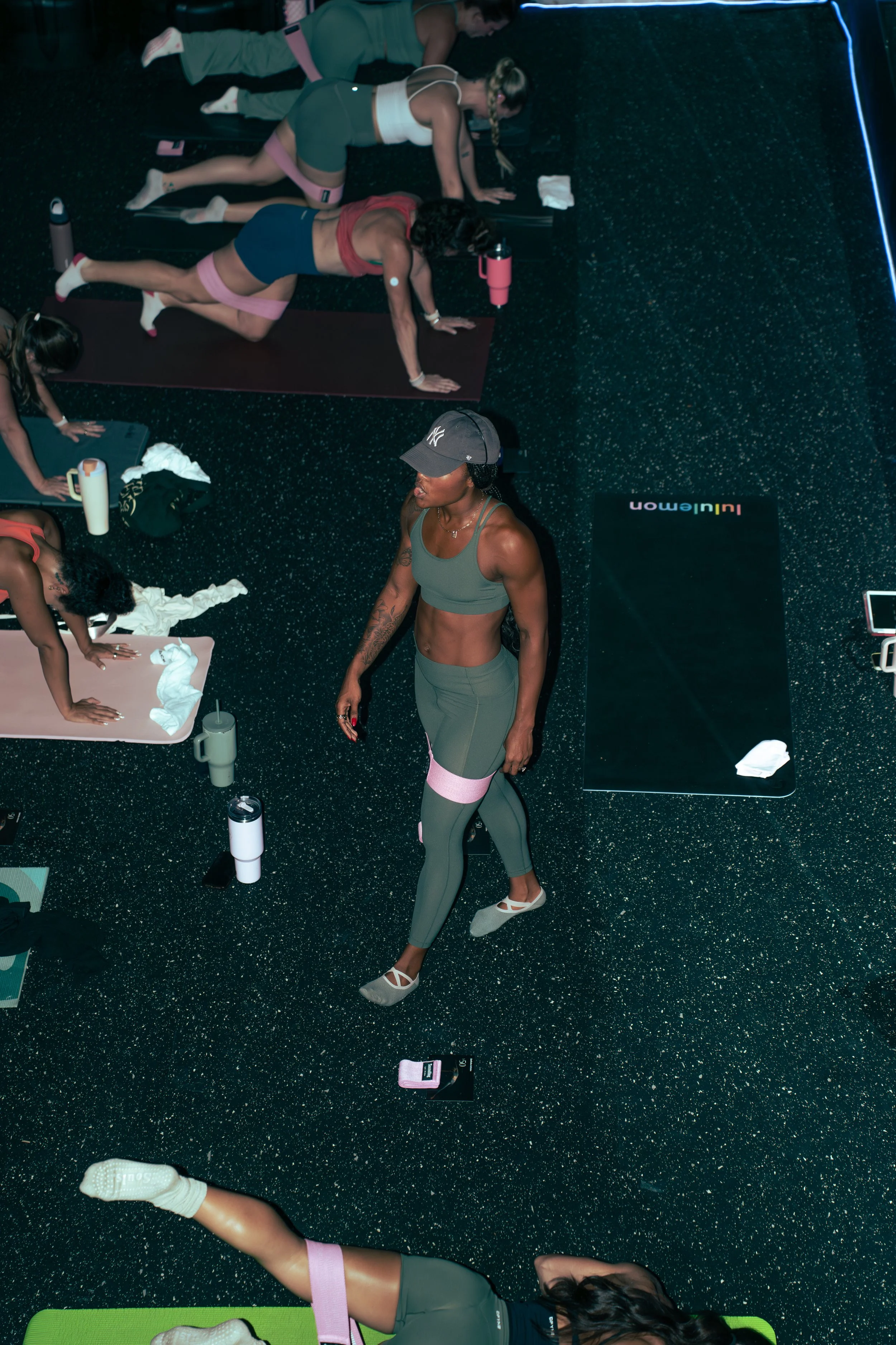 Pilates instructor leading guests through a group fitness event in Sarasota.