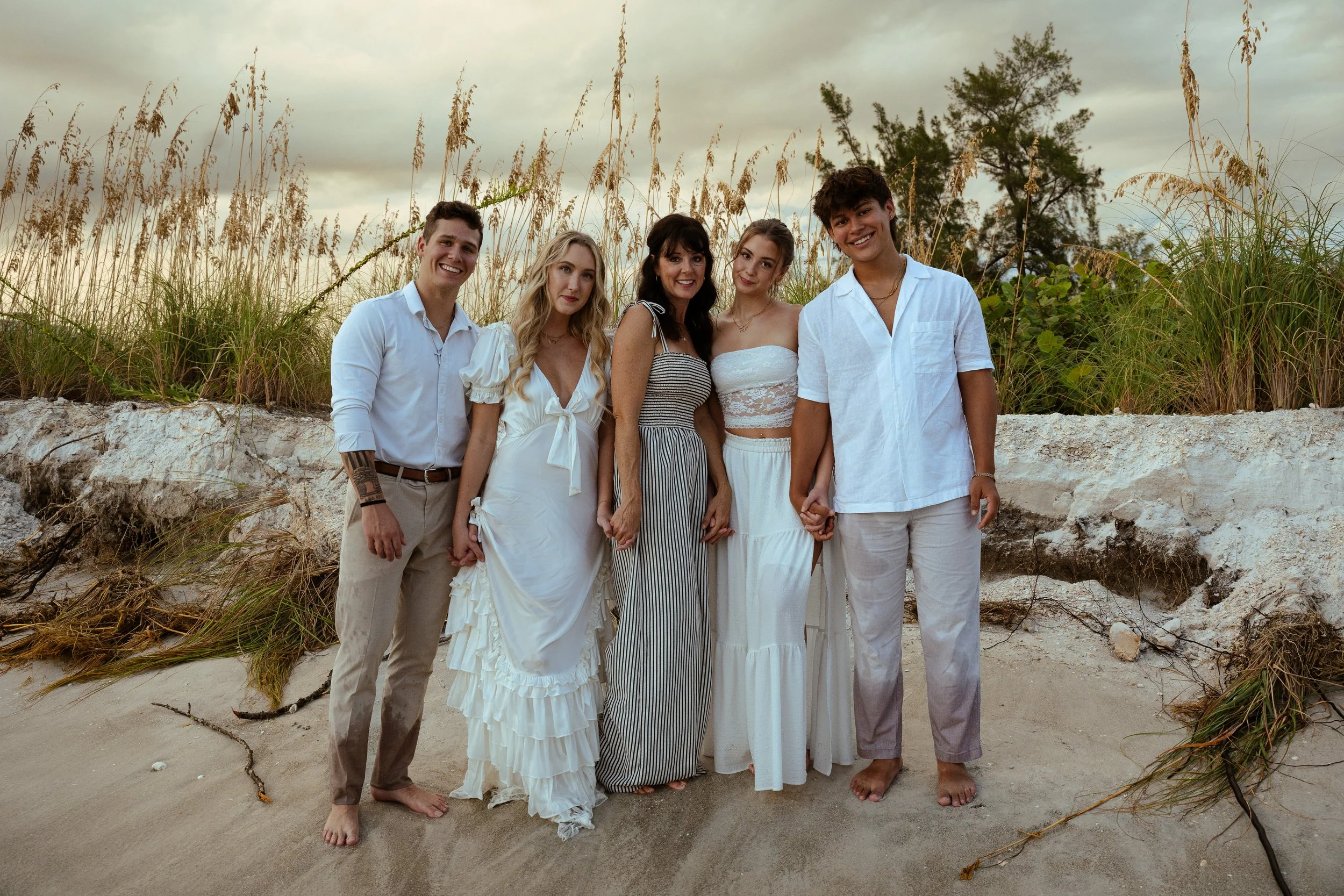 Family portrait at Lido Key Beach in Sarasota Florida