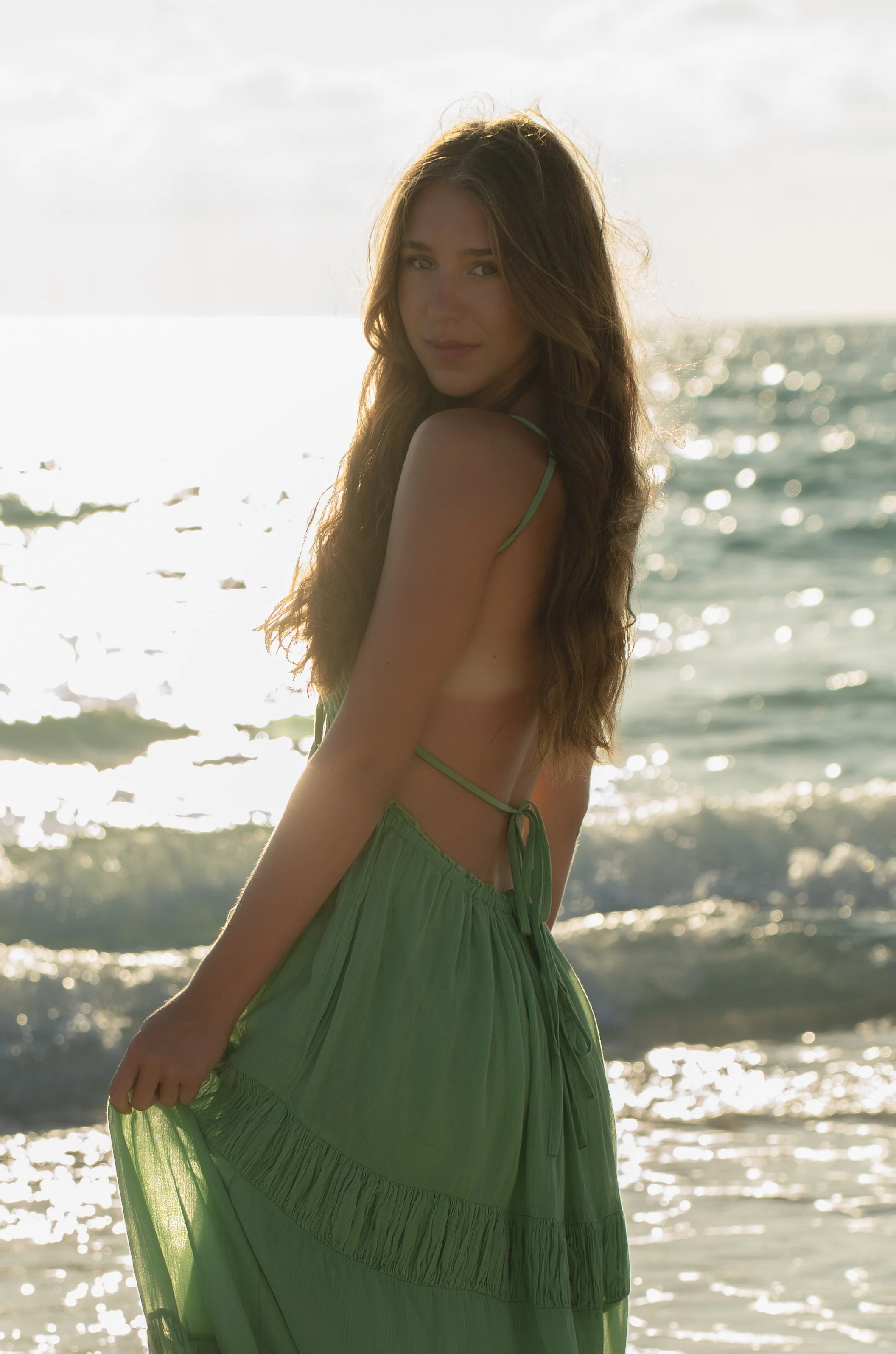 Beach senior portrait photographed at sunset in Bradenton Florida