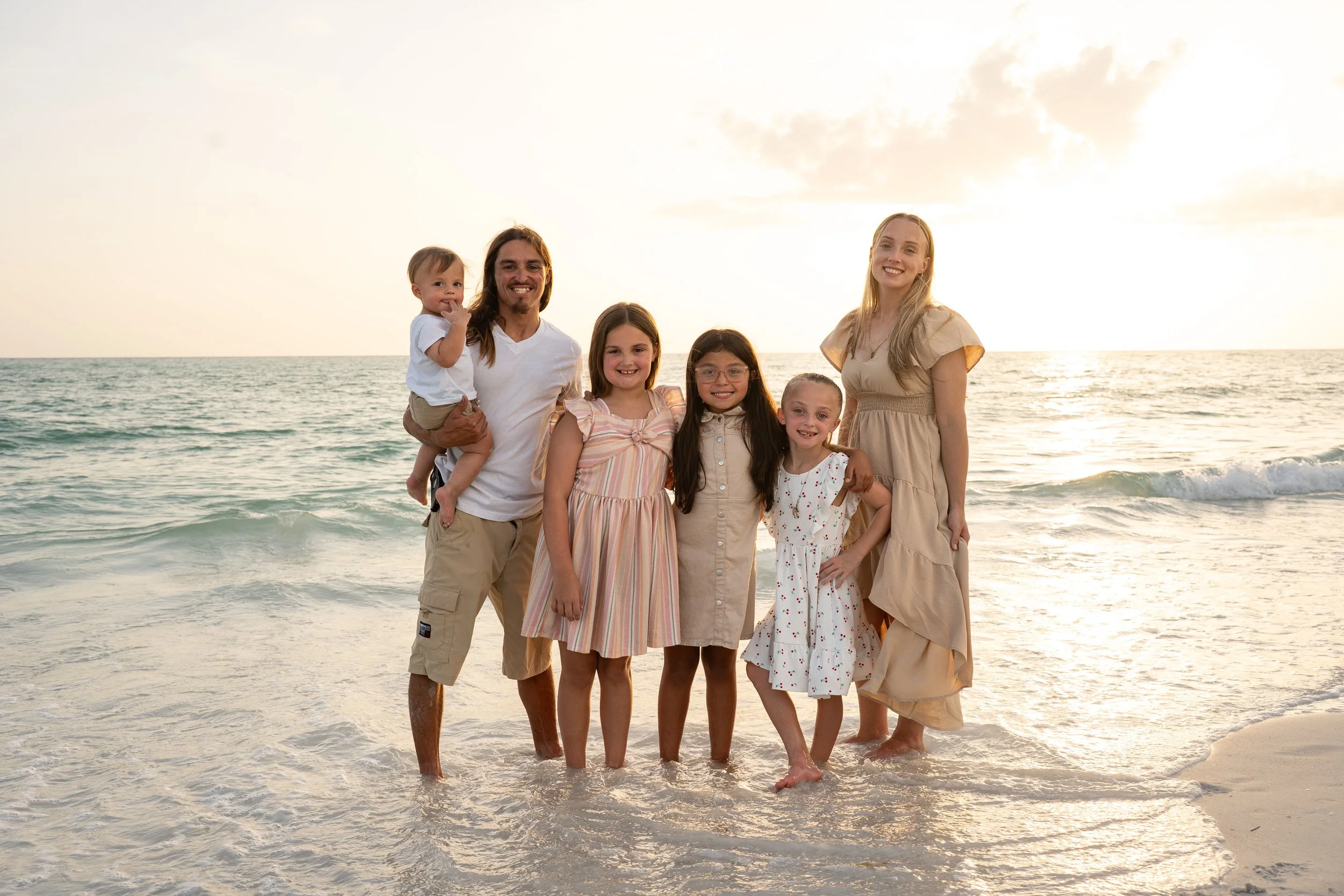 Family portrait at sunset on Coquina Beach Anna Maria Island