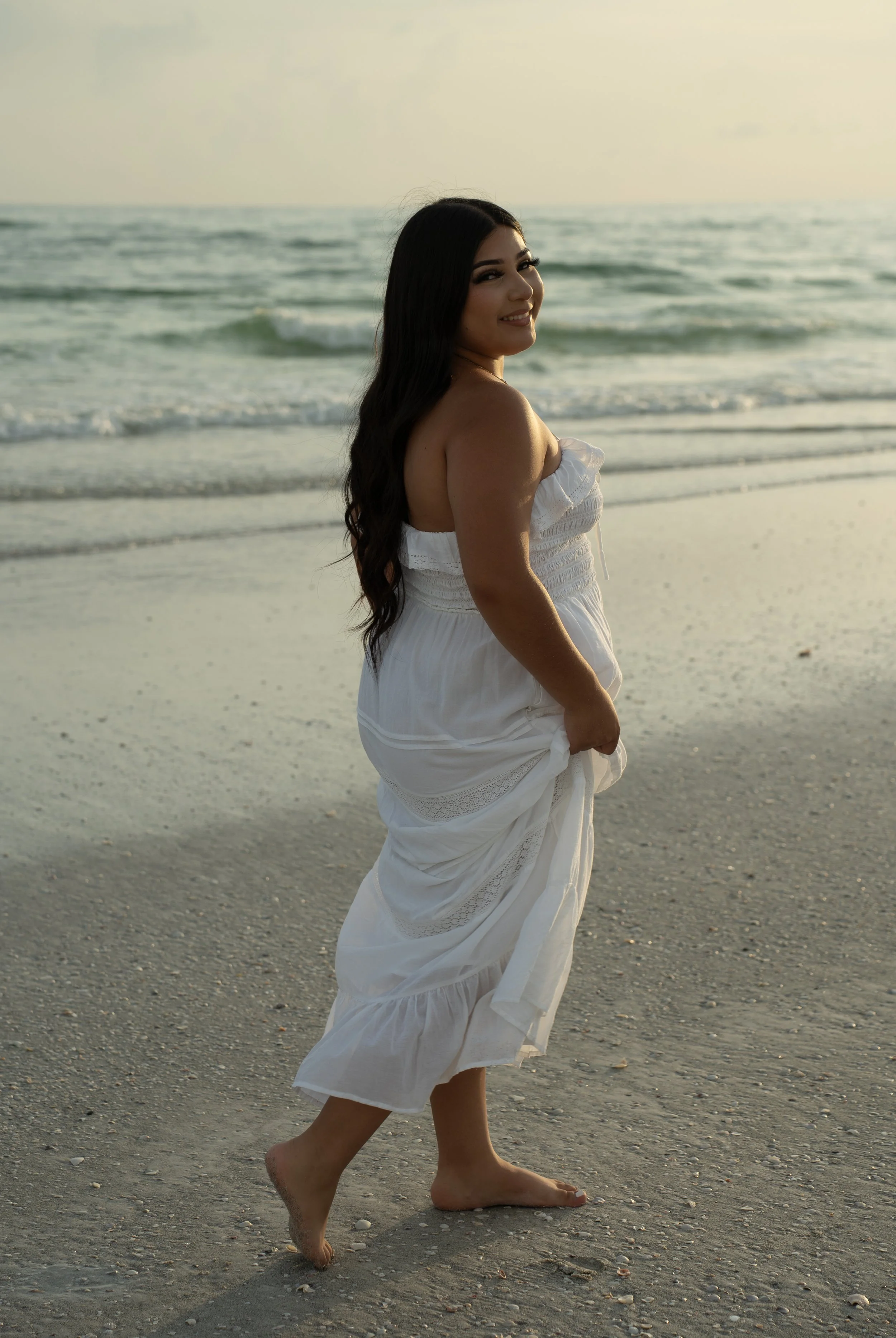 Senior portrait by the Gulf at Lido Key Beach in Sarasota Florida