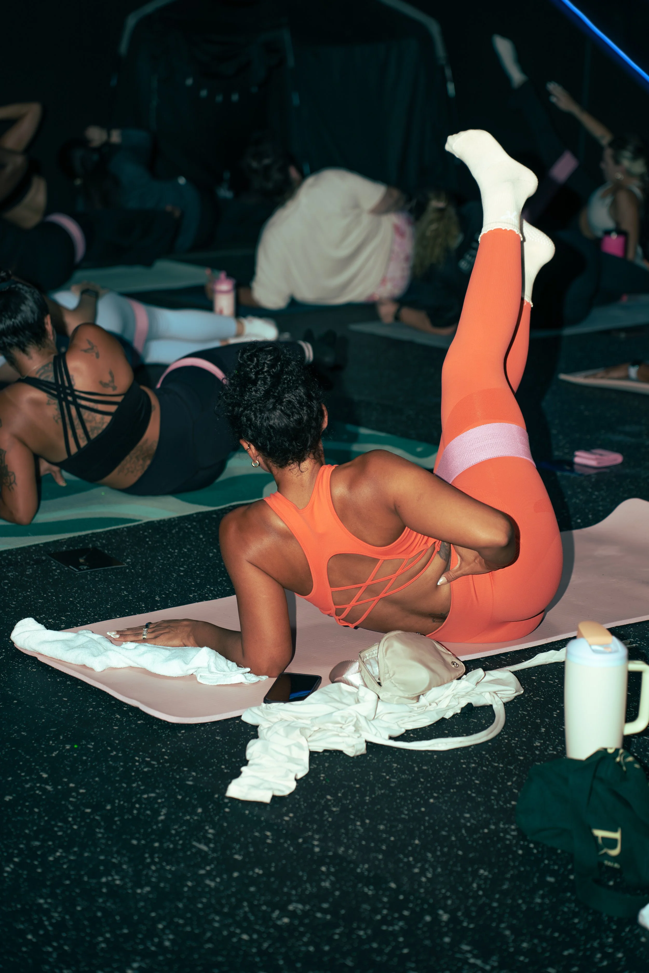 Guests participating in a Pilates class at an Alorae Wellness event in Sarasota, Florida.