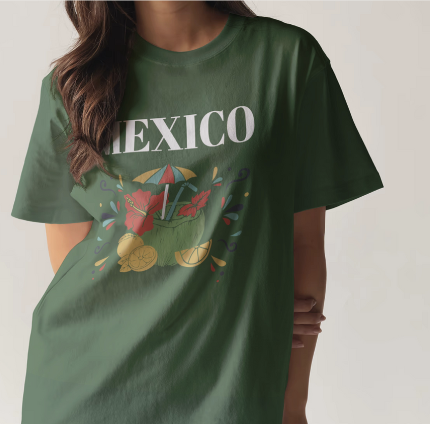 Green T-shirt with Mexico-themed graphic, featuring a tropical drink with an umbrella, fruit slices, and hibiscus flowers.