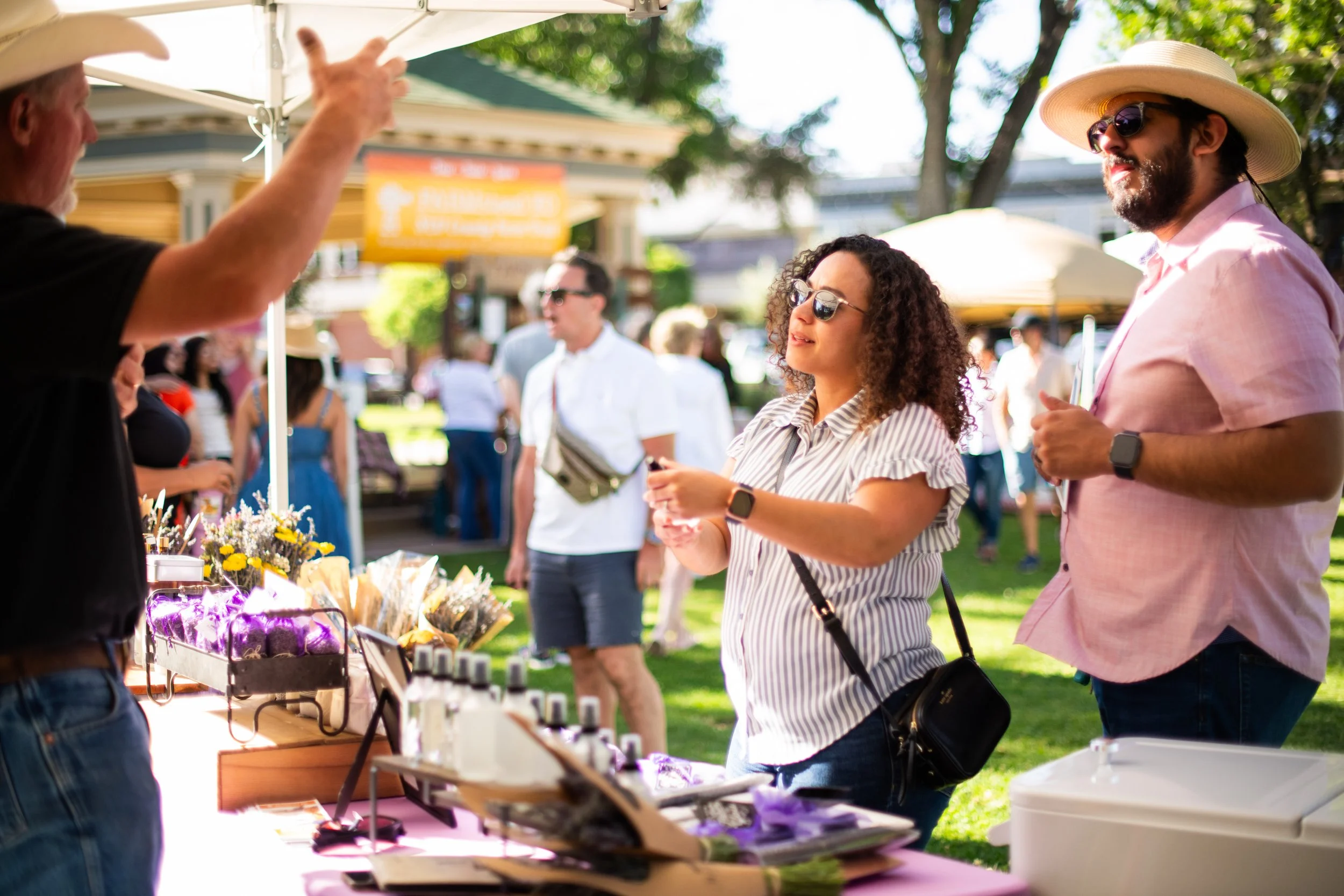Shoppers at an outdoor marketplace