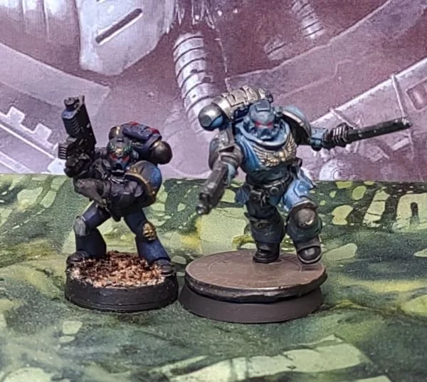 30K and 40K Space Marine side by side both for my Personal Chapter.