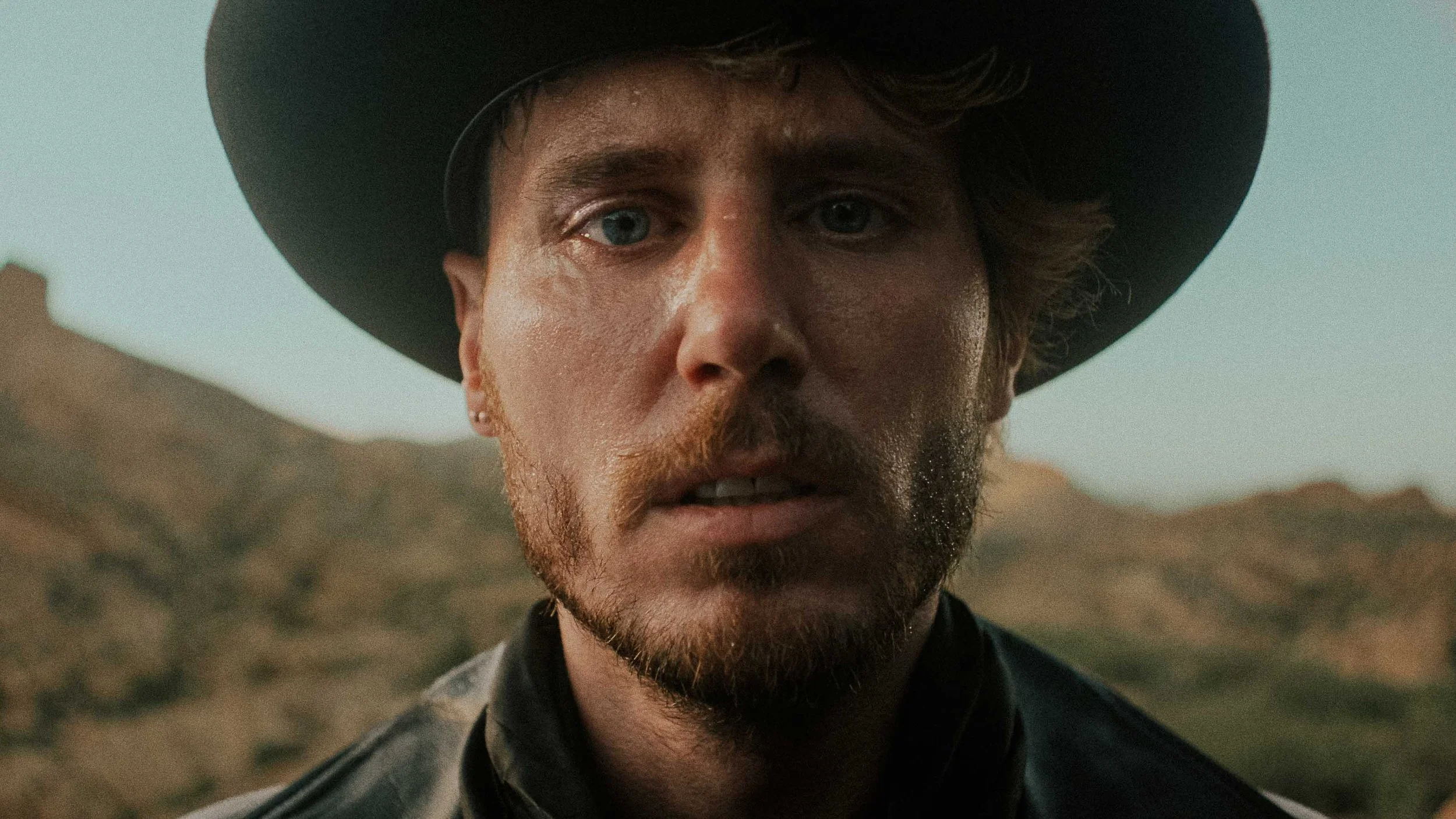 quinn-taplin-zillion-devil-music-video-closeup-hat-portrait.jpg