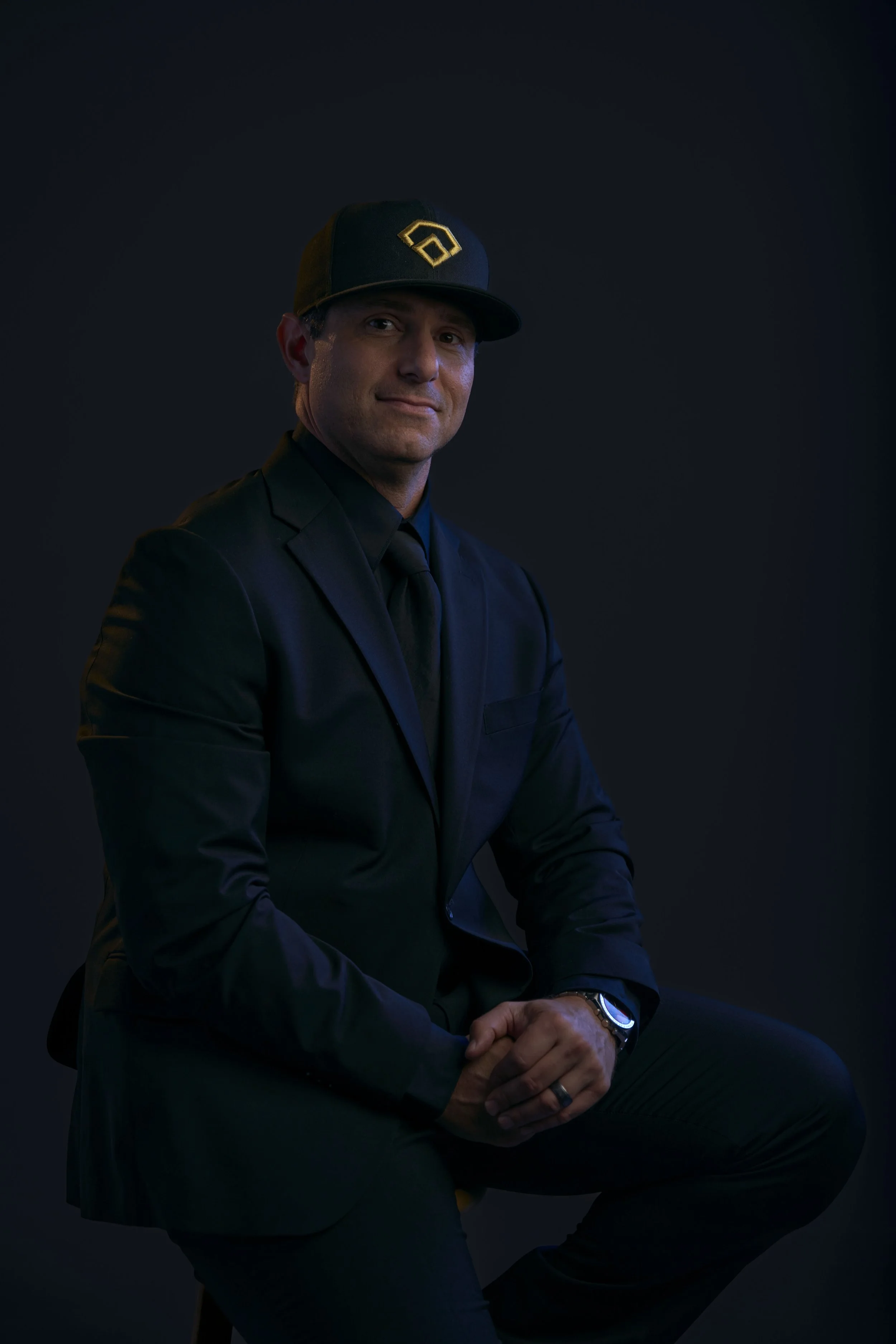quinn-taplin-rc13-sports-sitting-portrait-suit.jpg