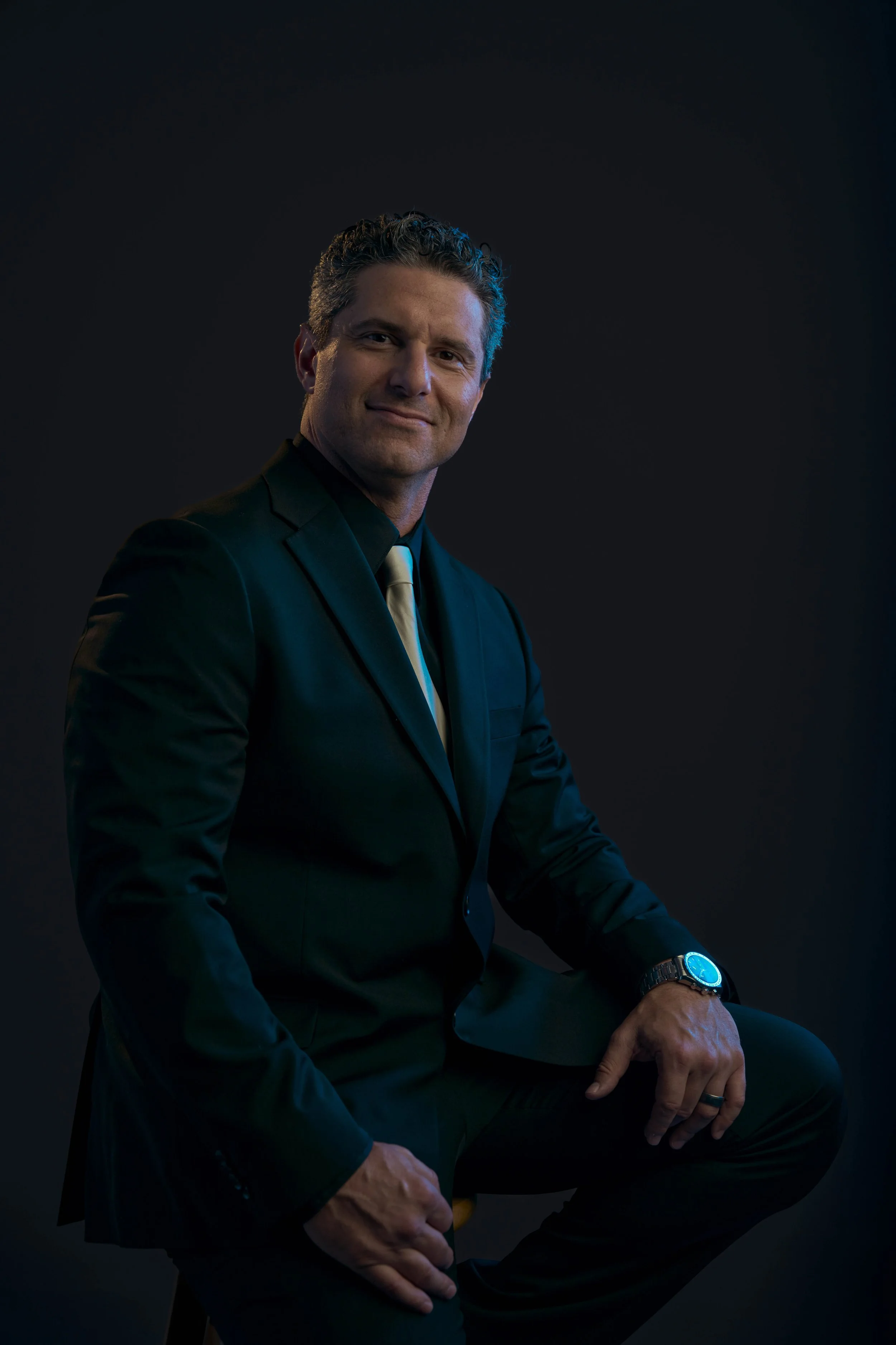 quinn-taplin-rc13-sports-suit-tie-smile-portrait.jpg