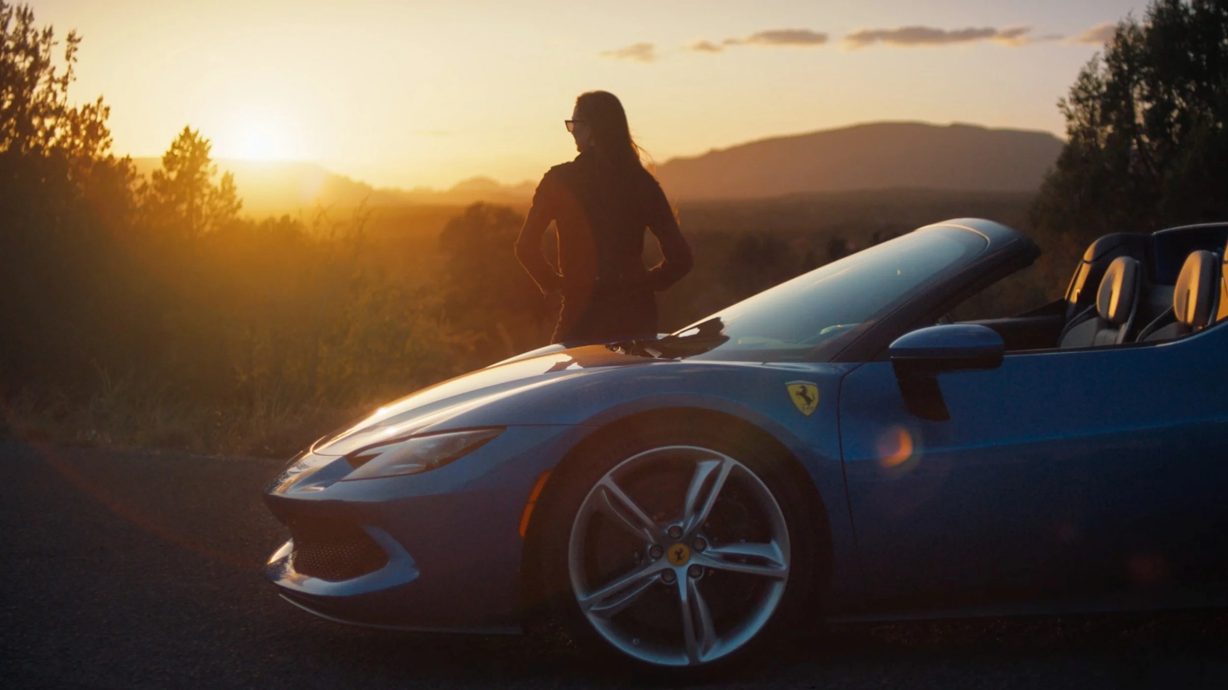 quinn-taplin-ferrari-postcards-sunset-silhouette-driver.jpg