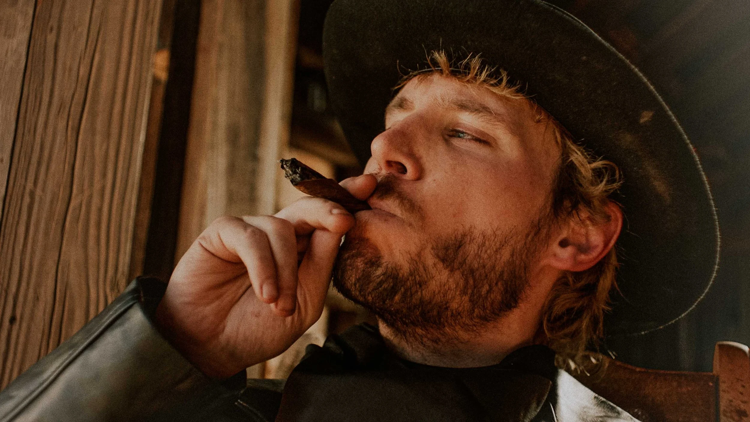 quinn-taplin-zillion-devil-music-video-cigar-closeup.jpg