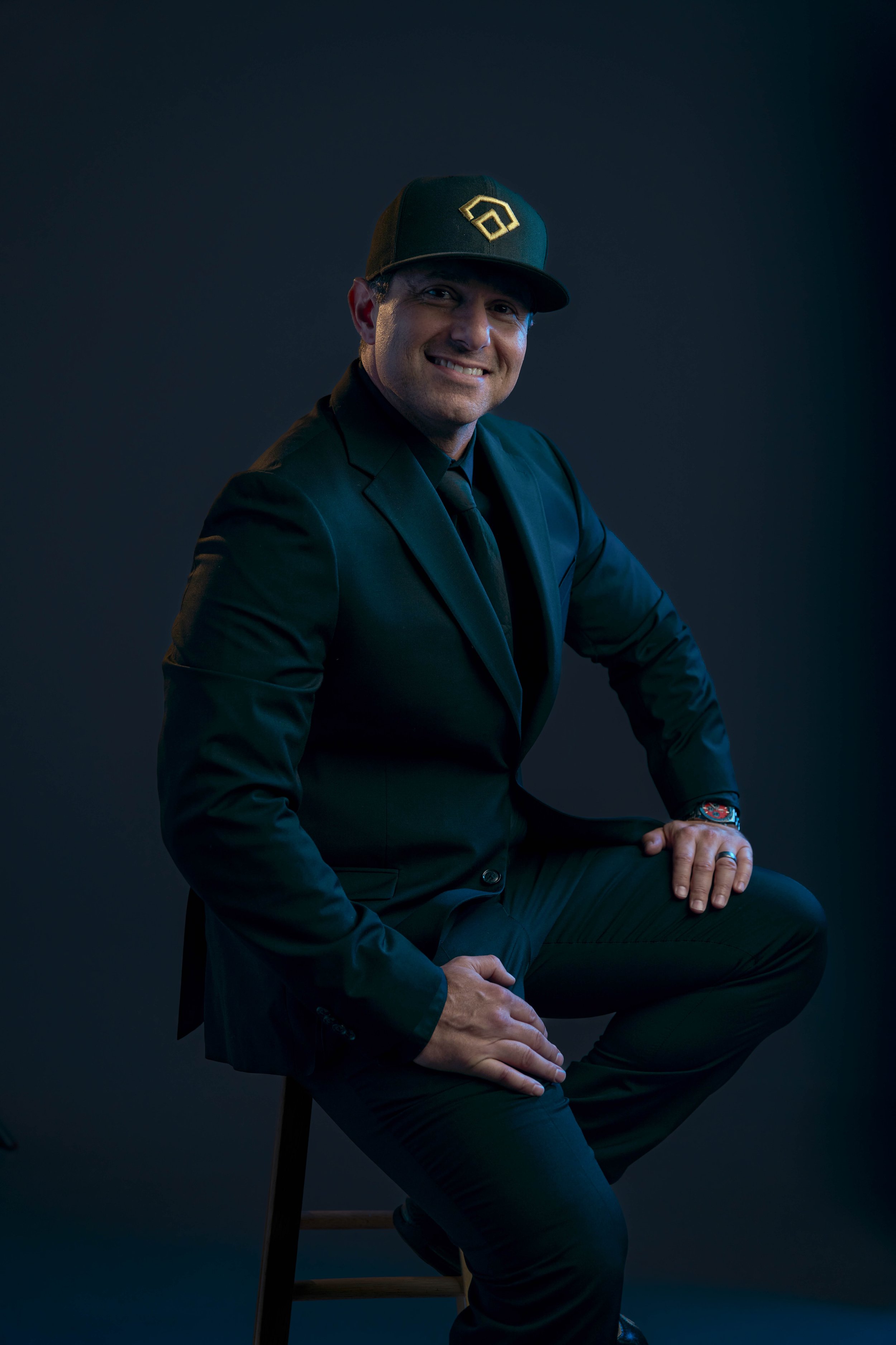 quinn-taplin-rc13-sports-suit-portrait-sitting-side.jpg