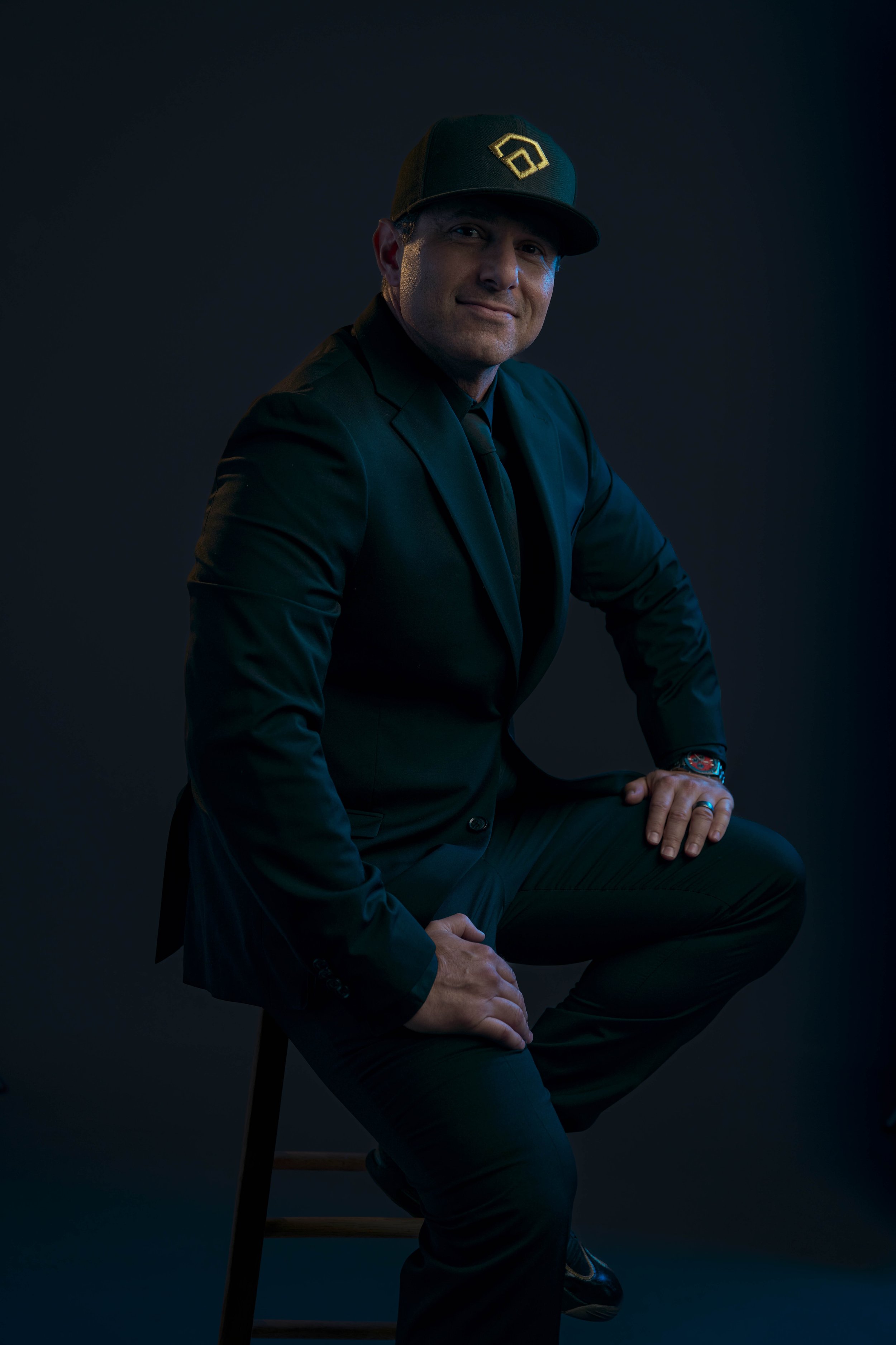 quinn-taplin-rc13-sports-suit-portrait-seated.jpg